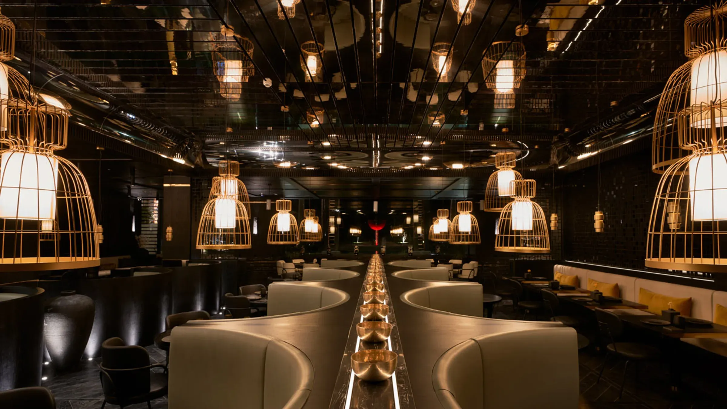 Ai KISU dining room with birdcage lanterns at LUX* Grand Baie
