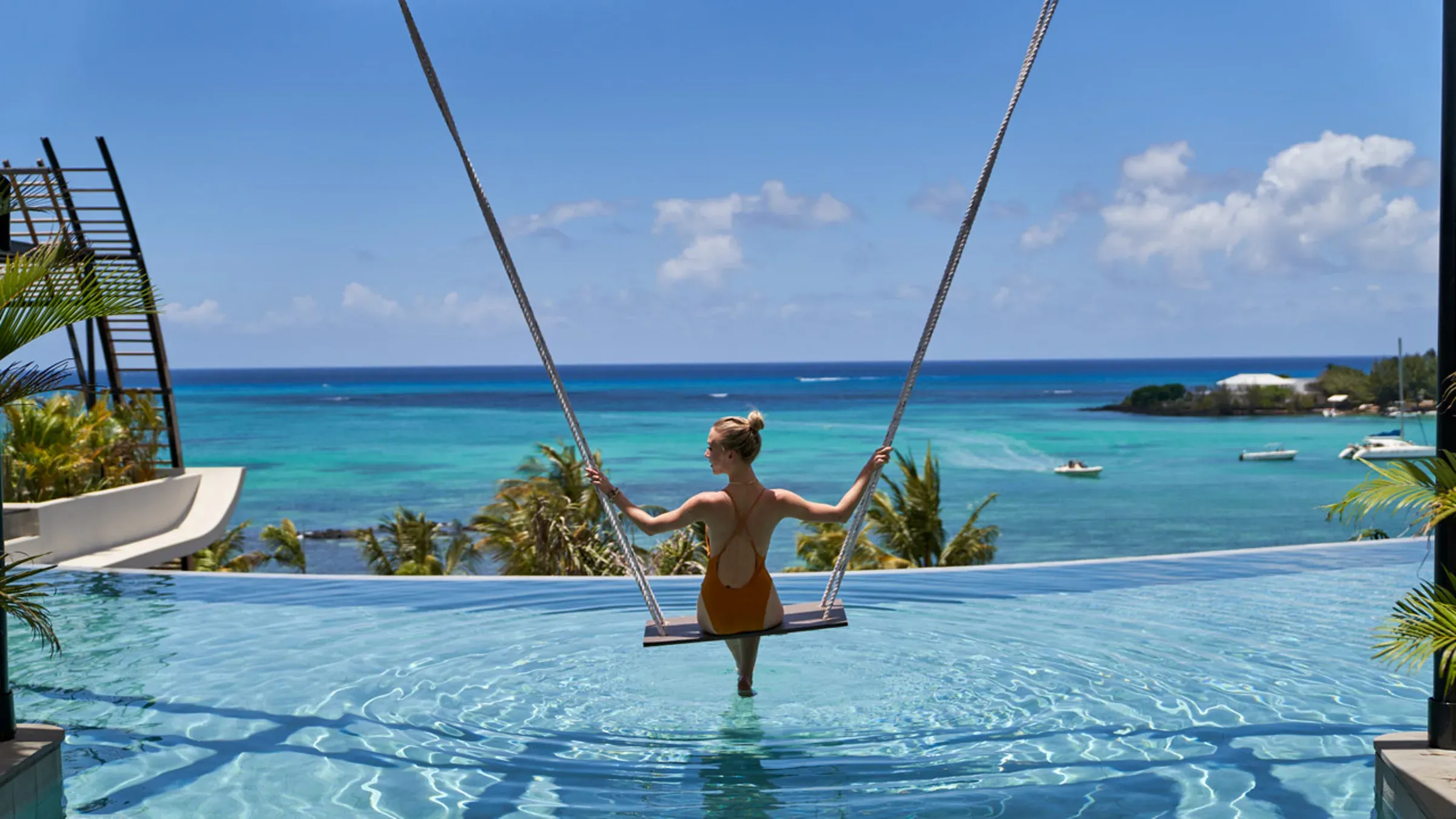 Bisou rooftop infinity pool and swing at LUX* Grand Baie