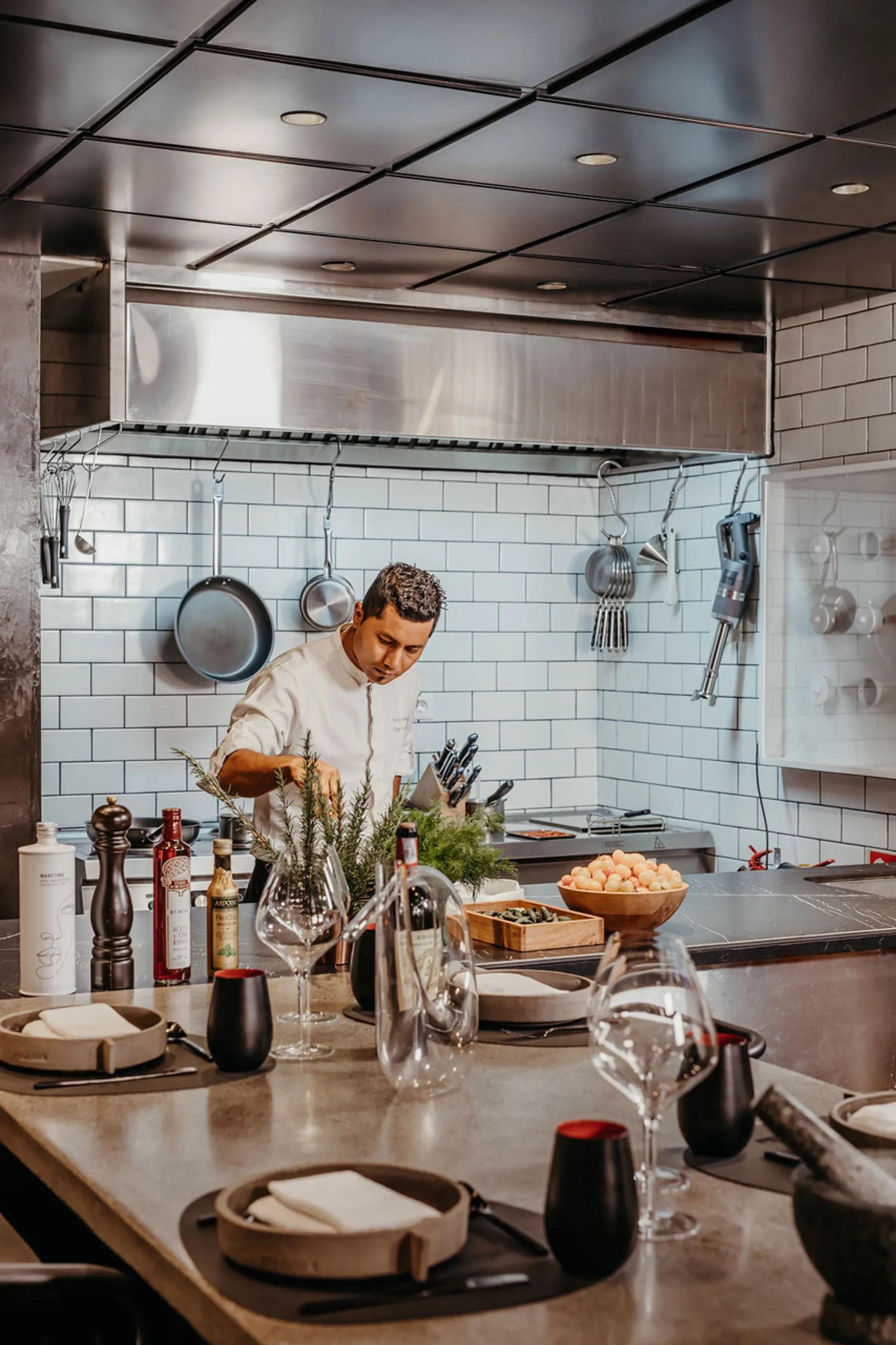 Chef at work in The Food Lab open kitchen at LUX* Grand Baie