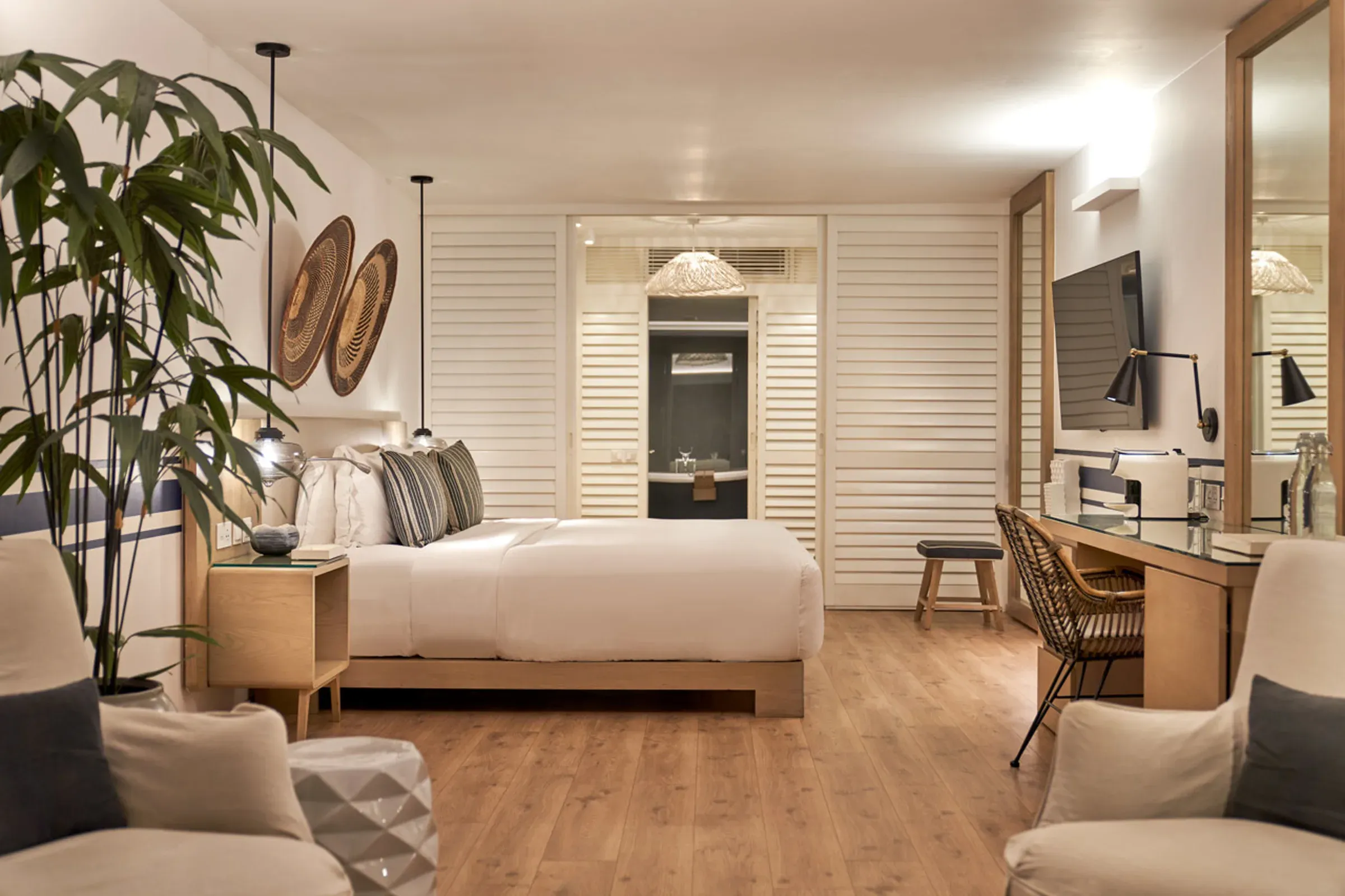 Junior Suite bedroom with beach access at LUX* Grand Gaube