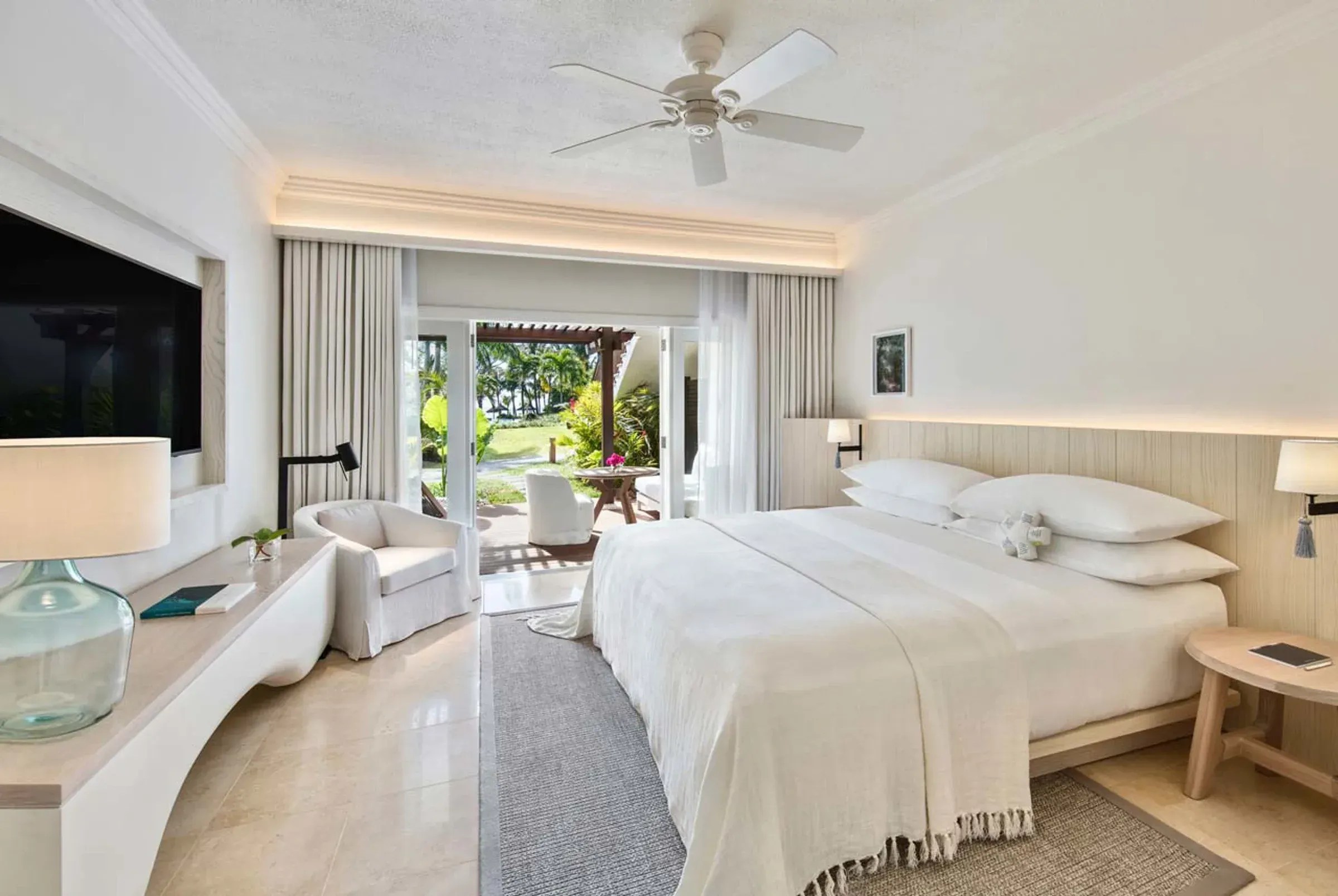 Deluxe Room interior with garden view at LUX* Le Morne Resort