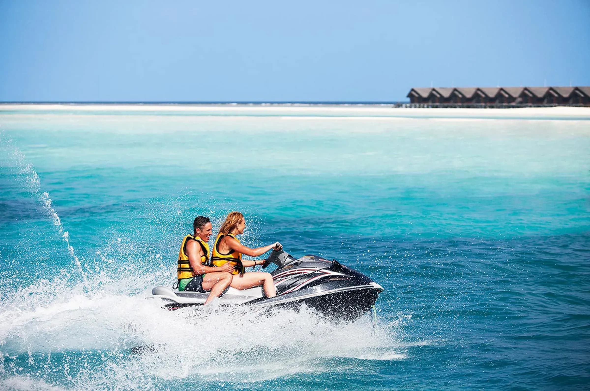 Jet ski watersports on the lagoon at LUX* South Ari Atoll