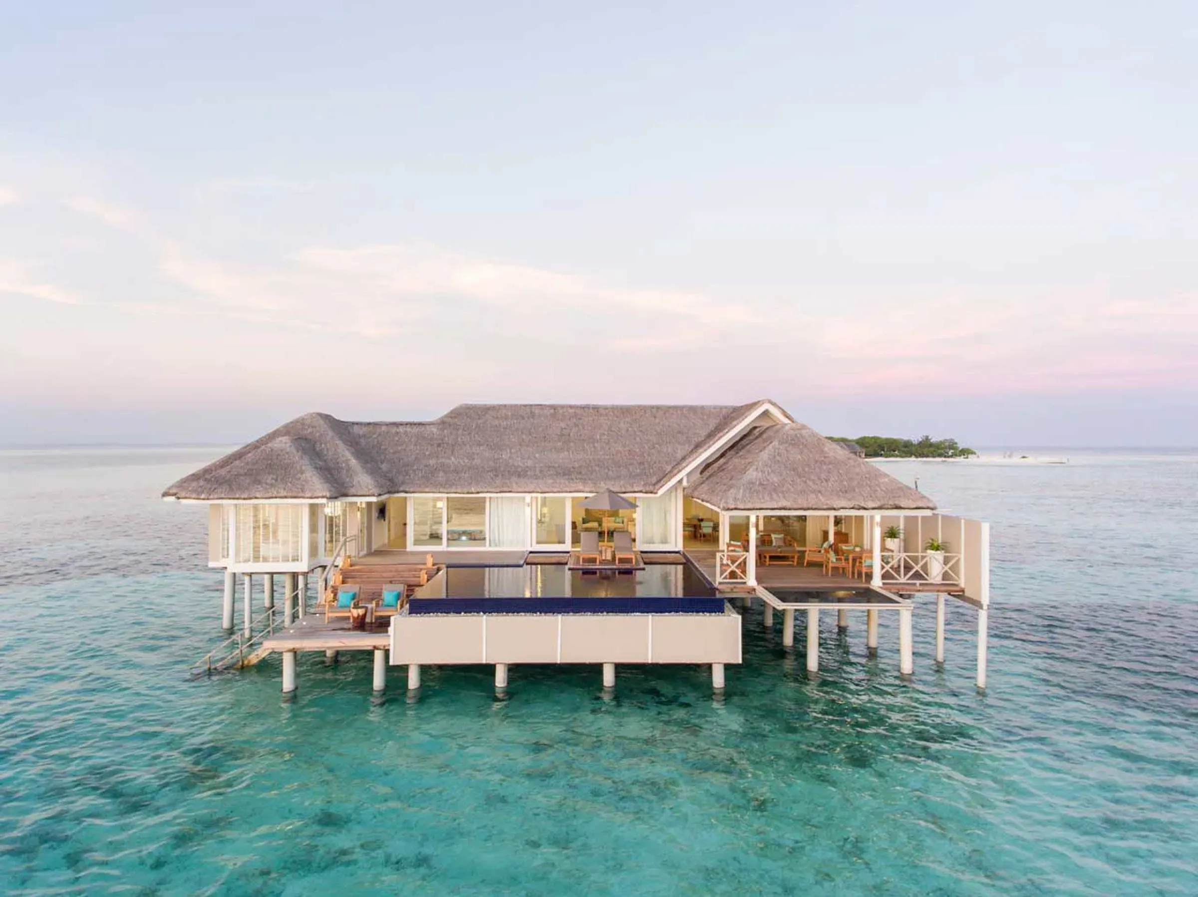 LUX* Villa private infinity pool and living pavilion at LUX* South Ari Atoll