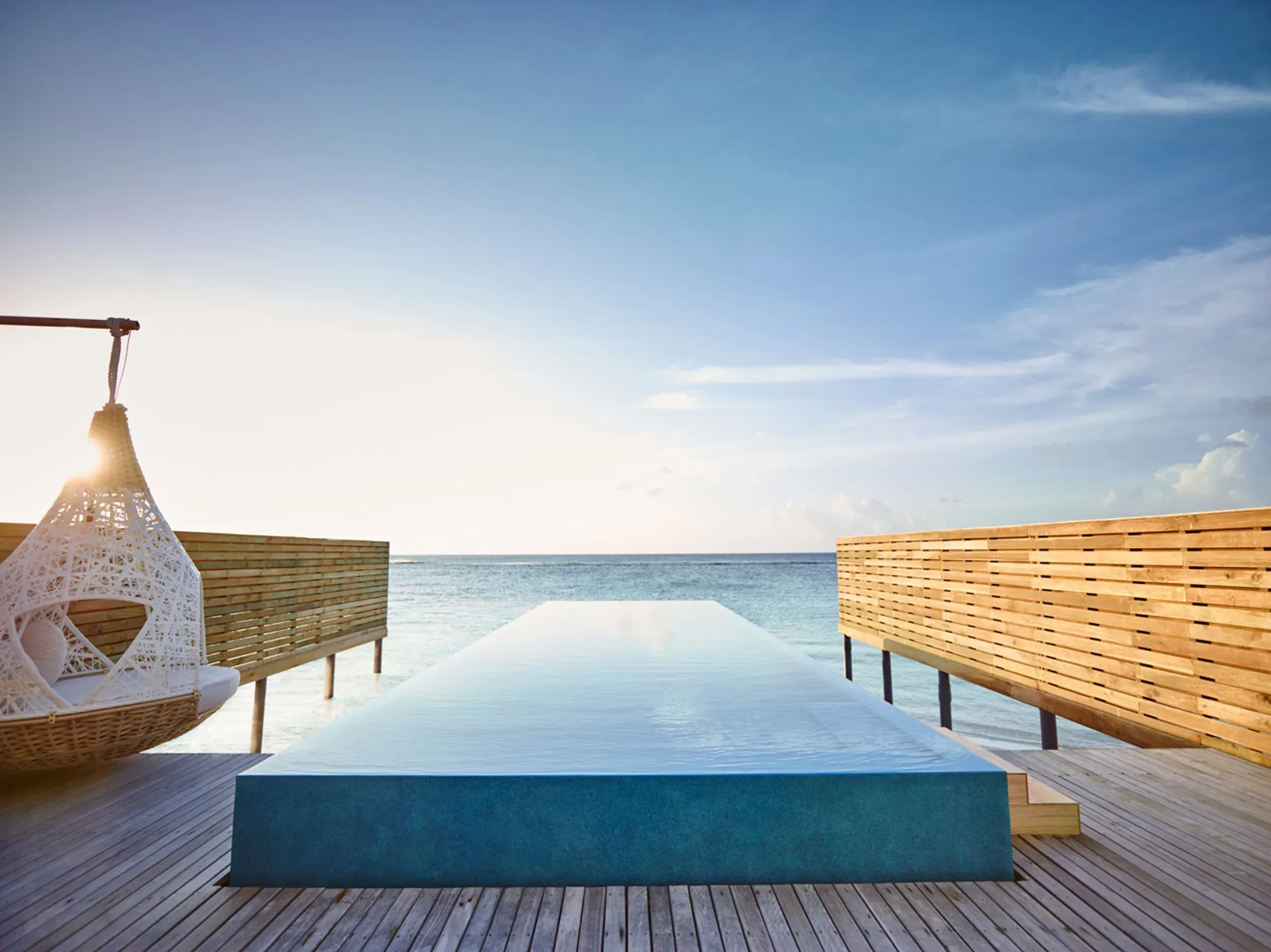 Temptation Pool Water Villa over the lagoon at LUX* South Ari Atoll