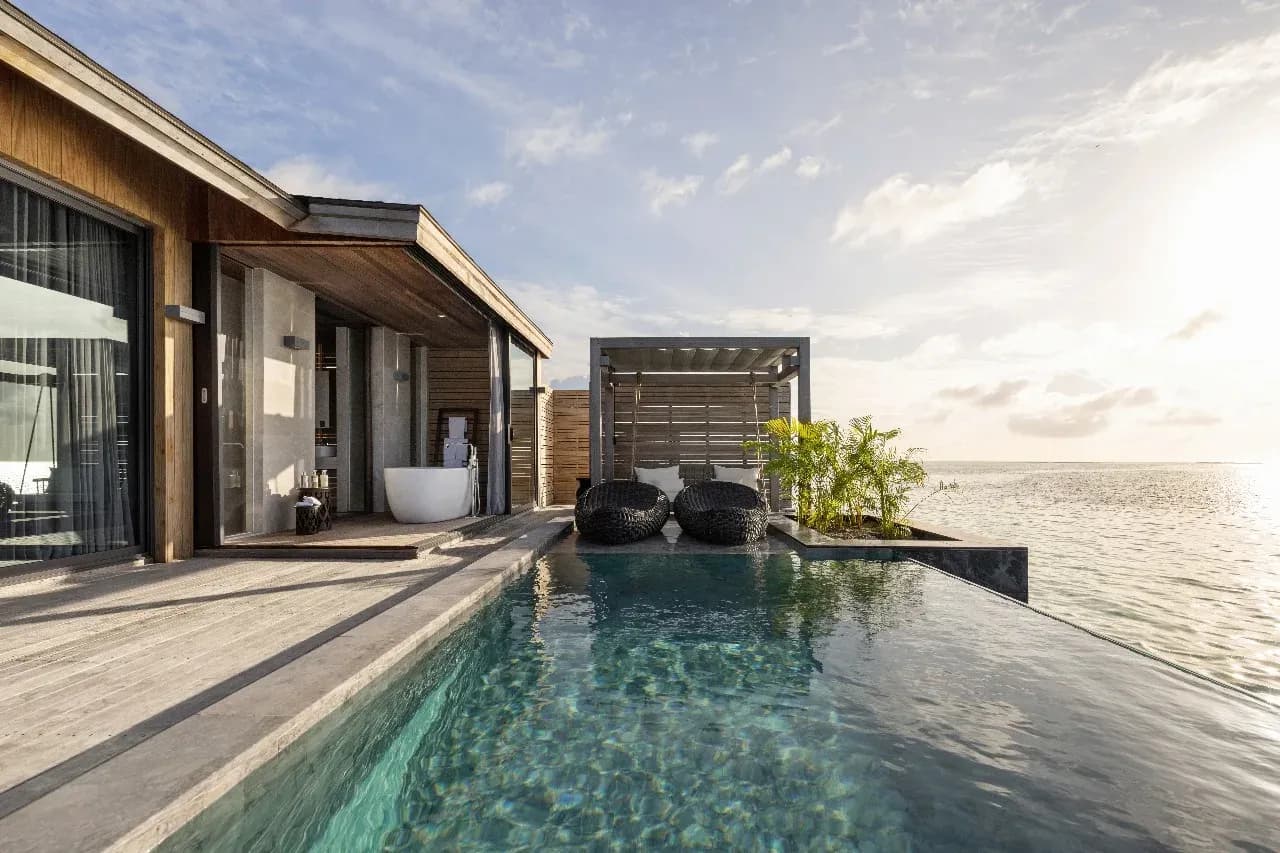 Sunset Aqua Pool Villa terrace and private pool over the lagoon