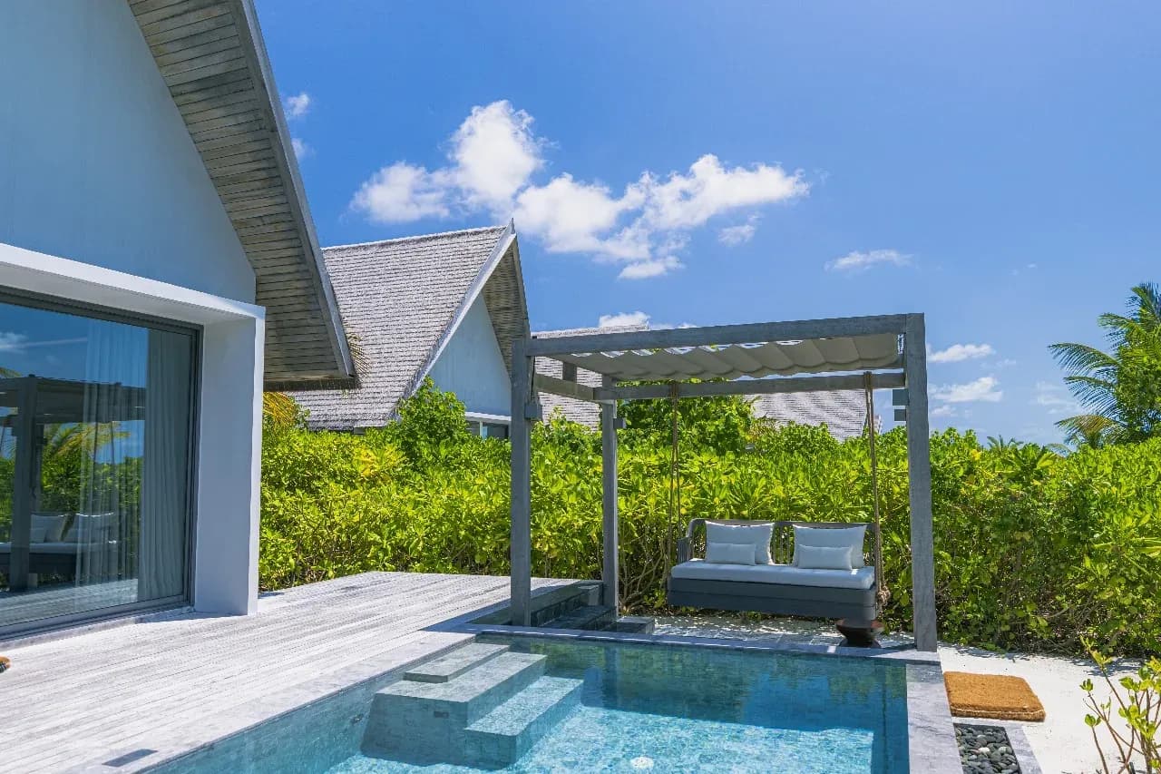Sunset Serene Pool Villa living space with garden pool