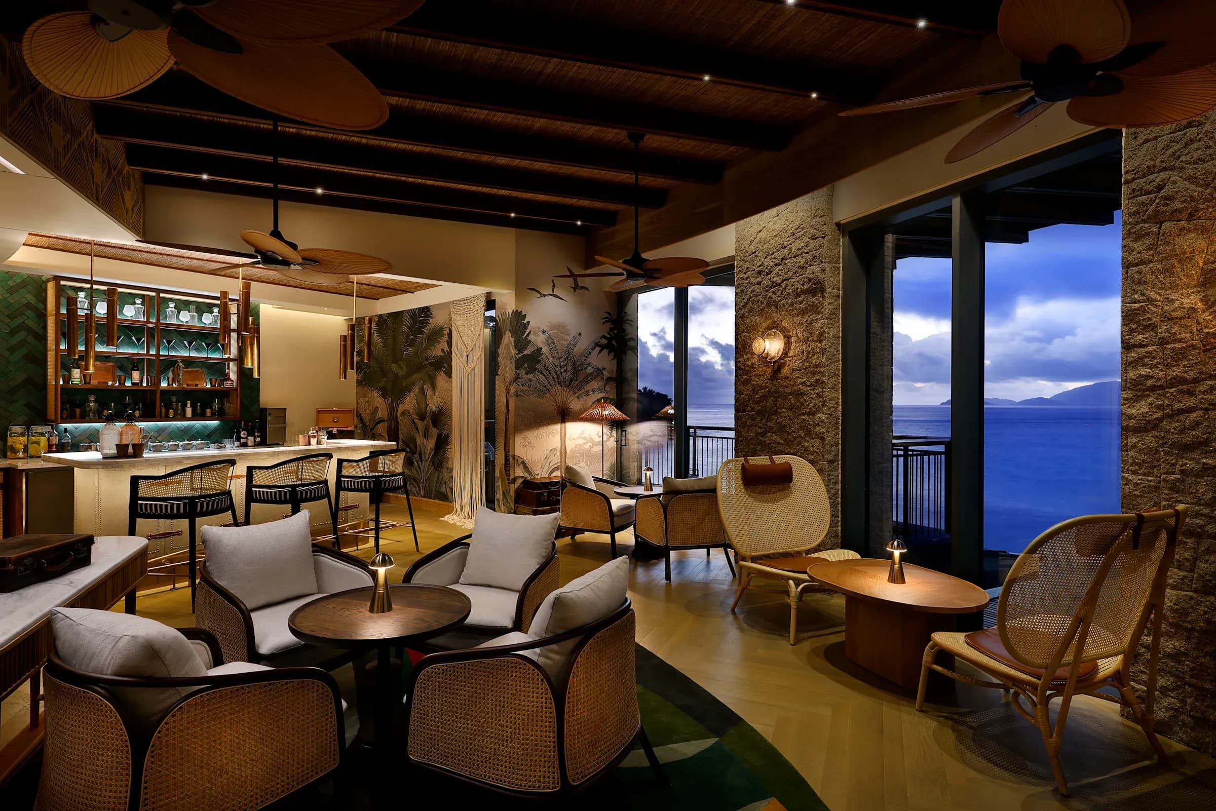 Kokoye Lounge dining area and bar overlooking the bay at Mango House Seychelles