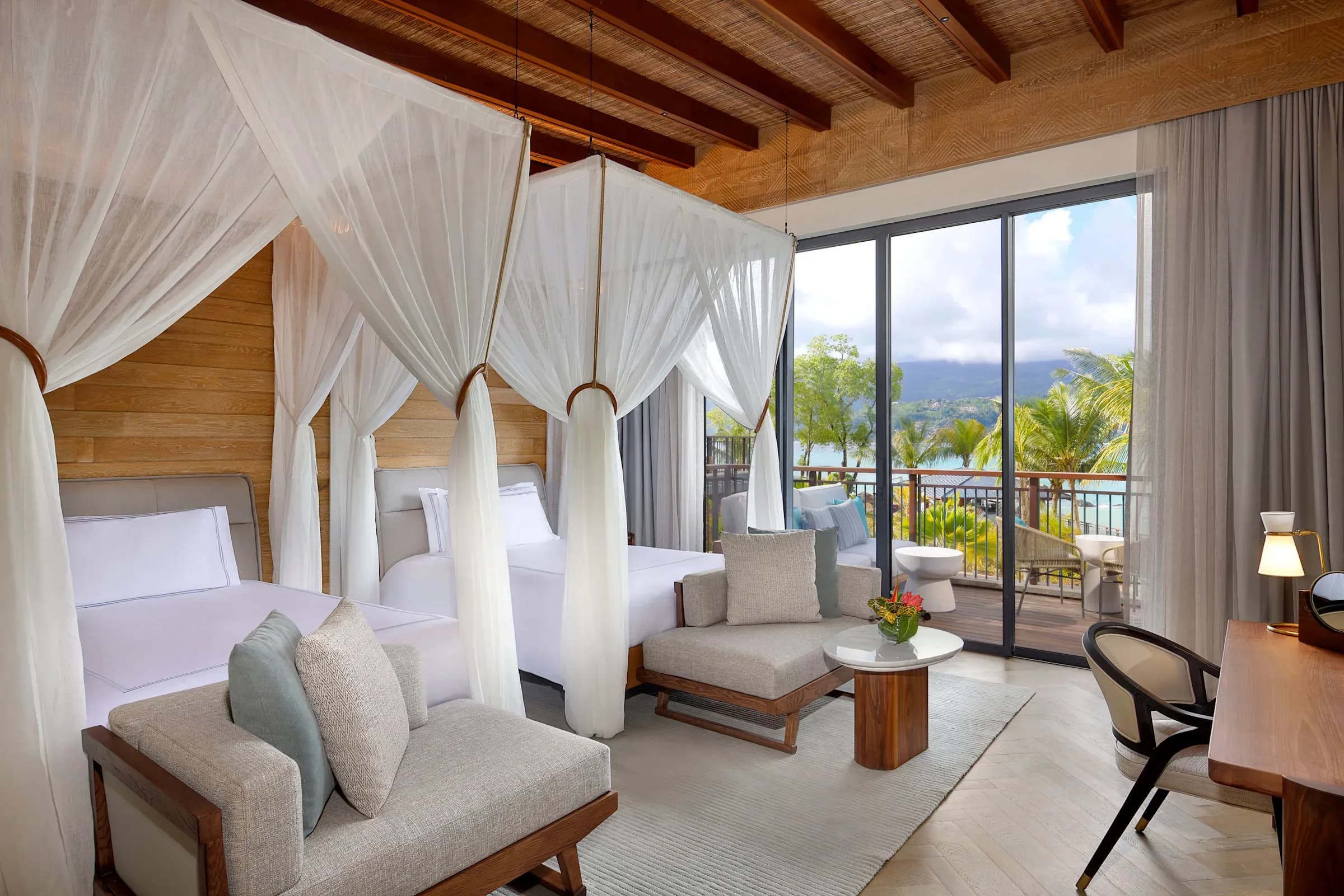 Twin Bed Premium Room with Ocean View interior and balcony at Mango House Seychelles