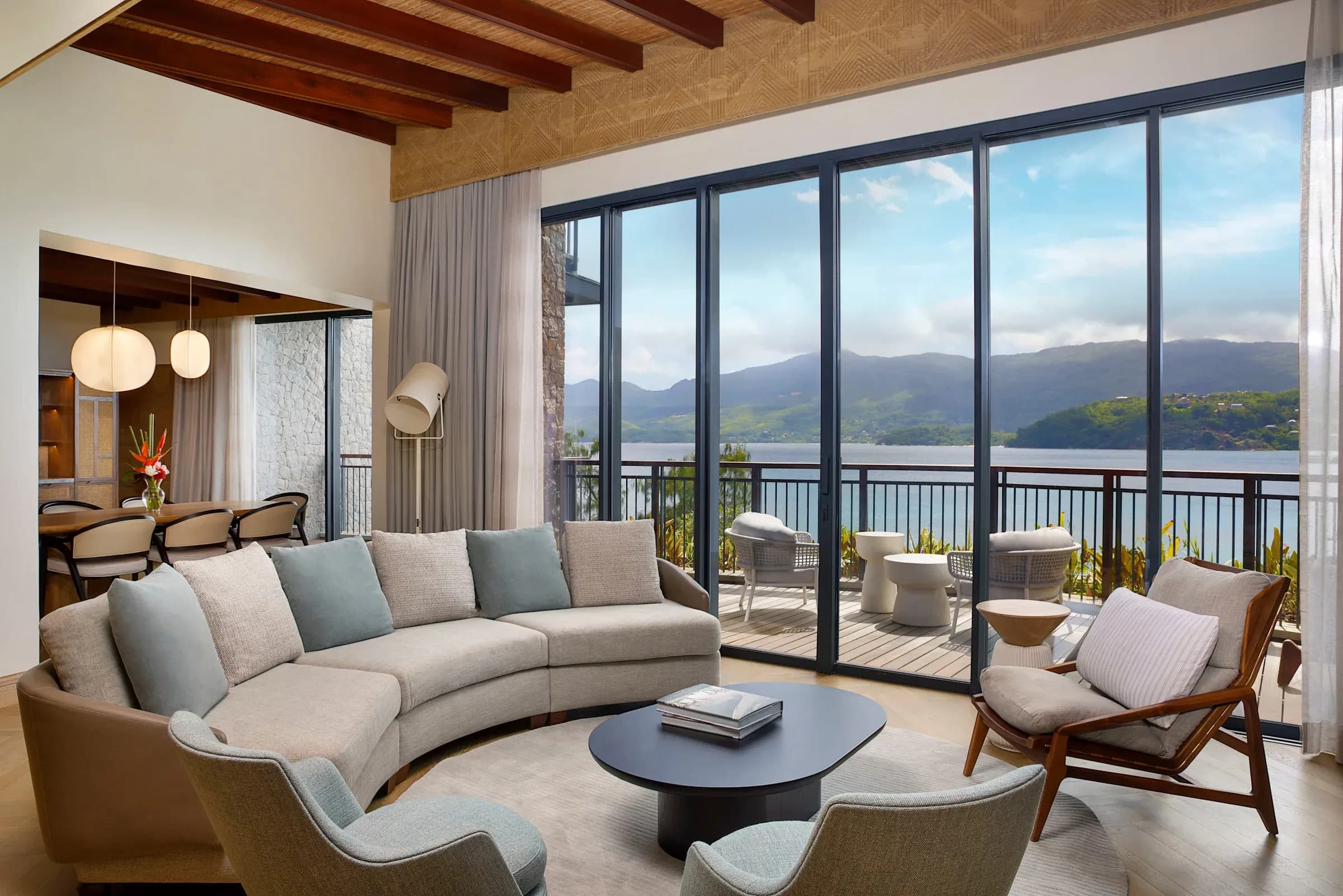 Two Bedroom Cliff House Panorama Suite living room overlooking Anse La Mouche Bay at Mango House Seychelles