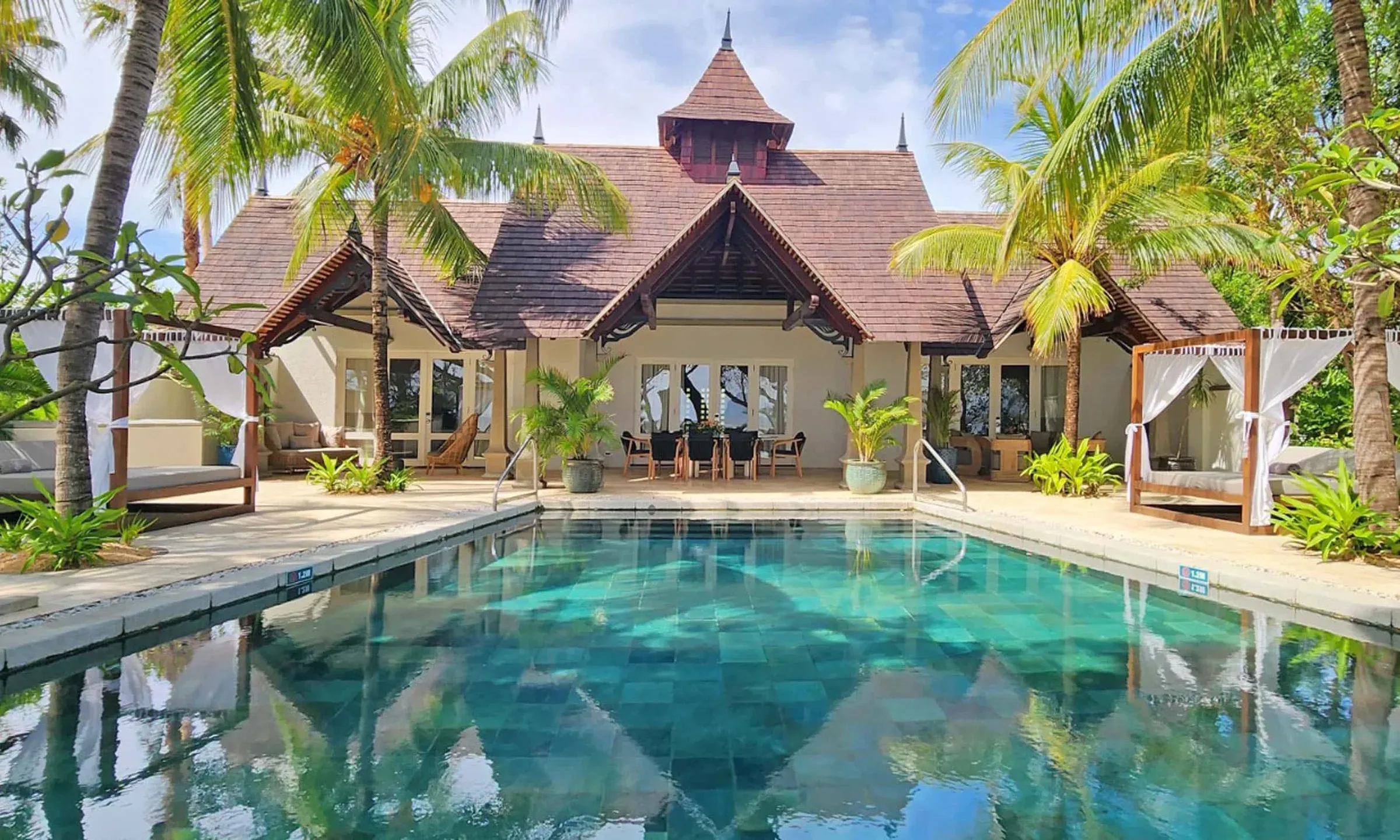 Exterior and private pool of a Presidential Beachfront Pool Villa at Maradiva