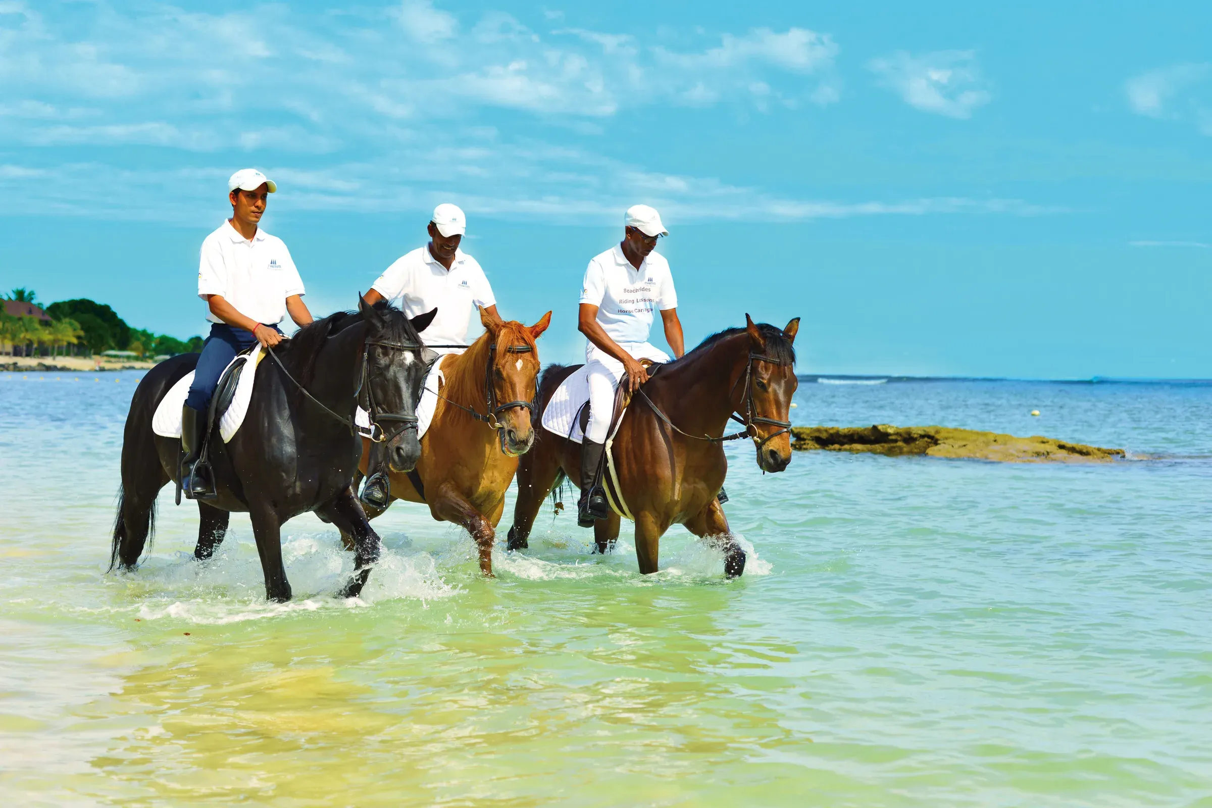 Horse riders on the beach at the Equestrian Centre, Maritim Resort & Spa Mauritius