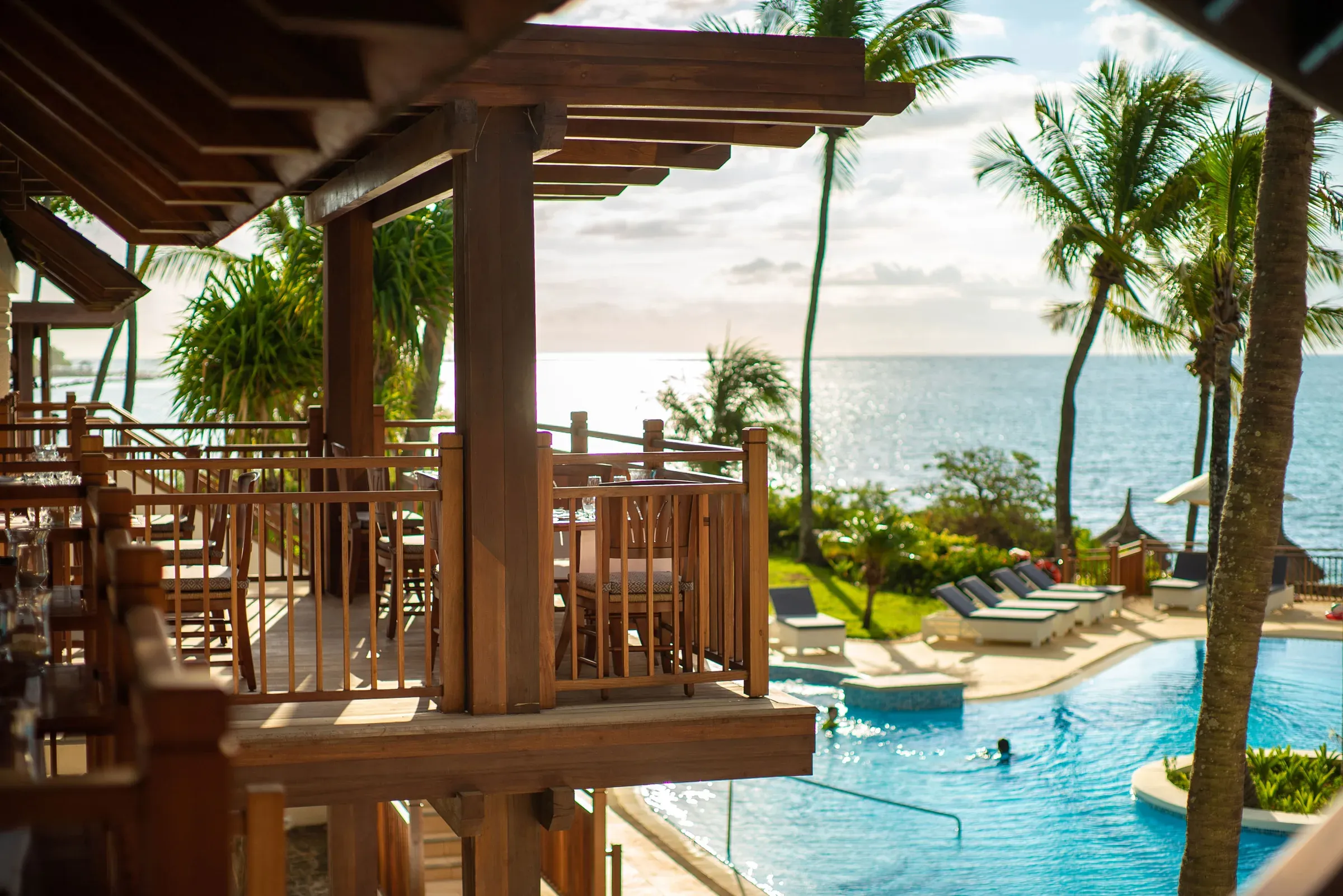 Belle Vue main restaurant terrace overlooking the pool and sea at Maritim Resort & Spa Mauritius