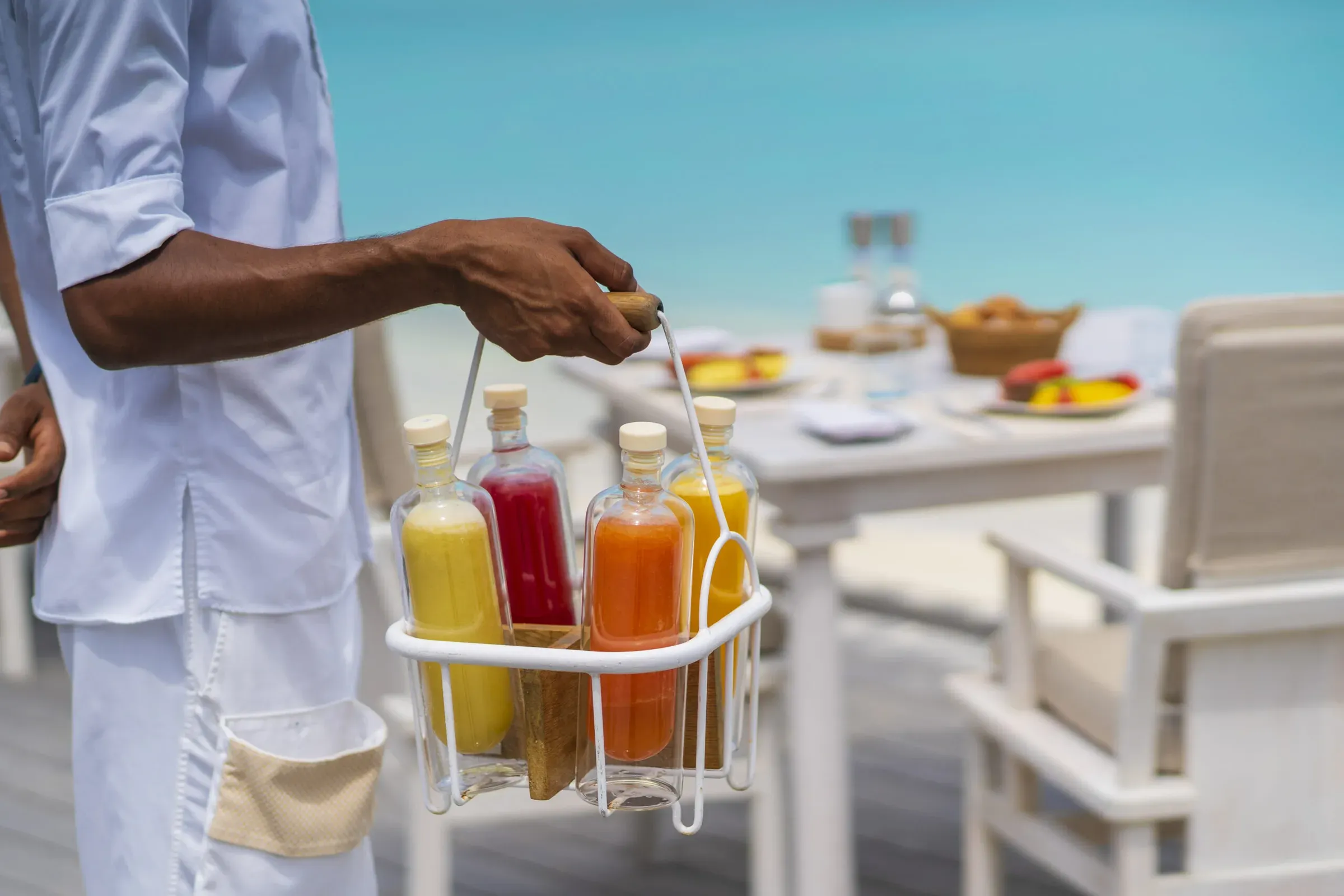 Fresh juice service on the deck at Ocean Restaurant, Milaidhoo