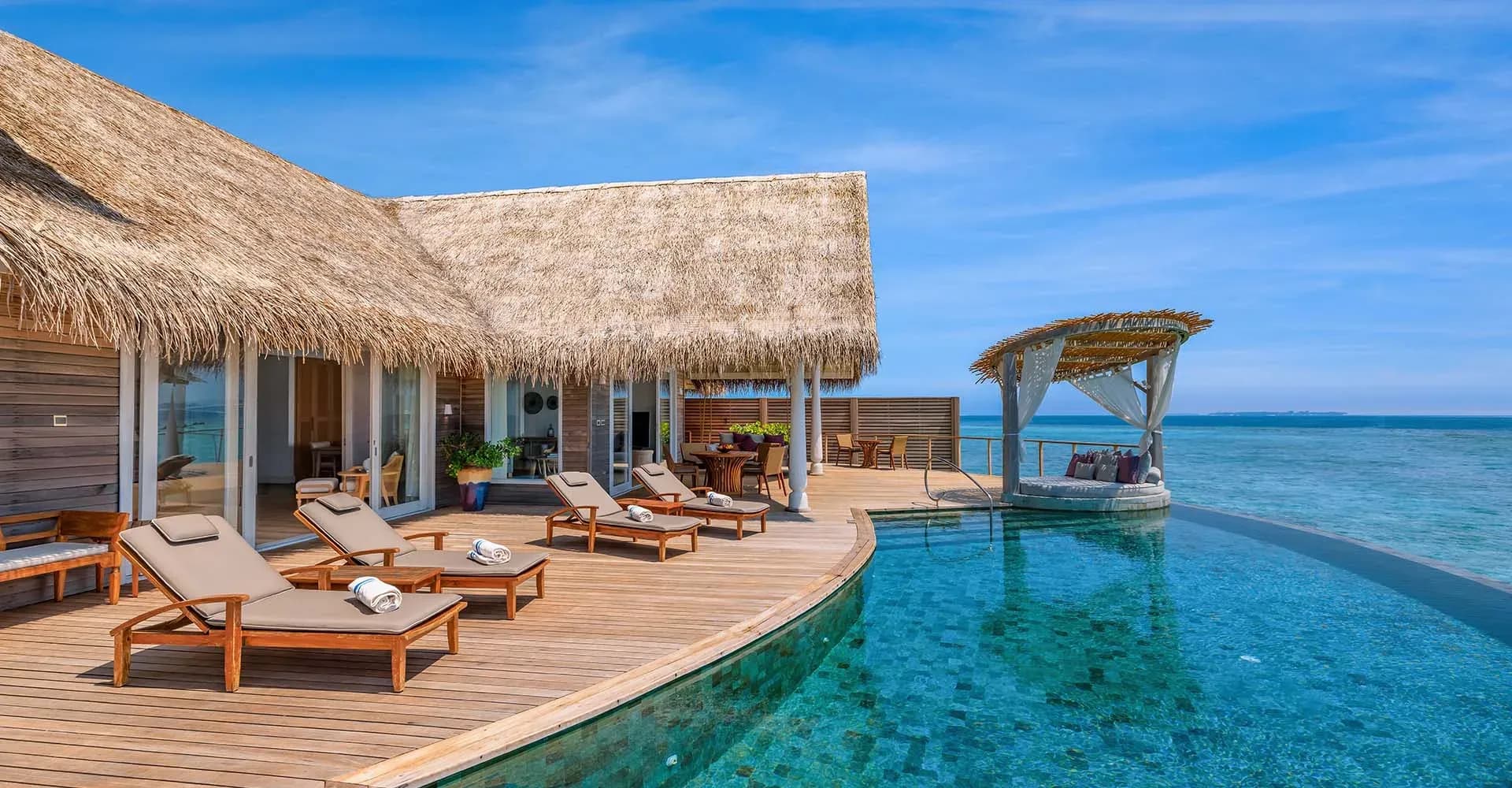 Two-Bedroom Ocean Residence overwater deck and infinity pool at Milaidhoo