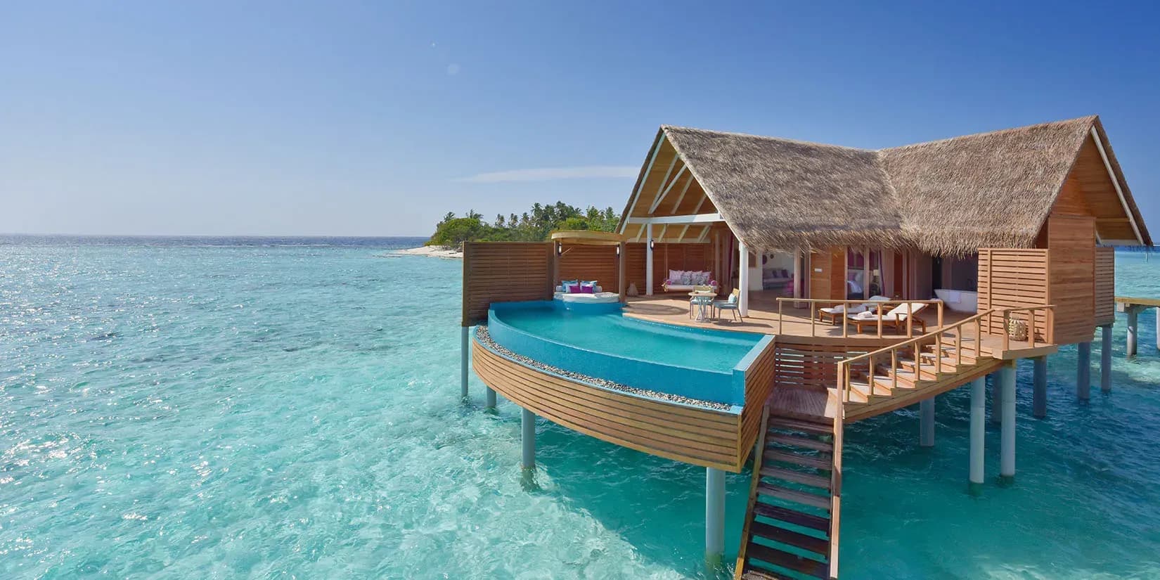 Water Pool Villa on stilts over the lagoon with private infinity pool at Milaidhoo