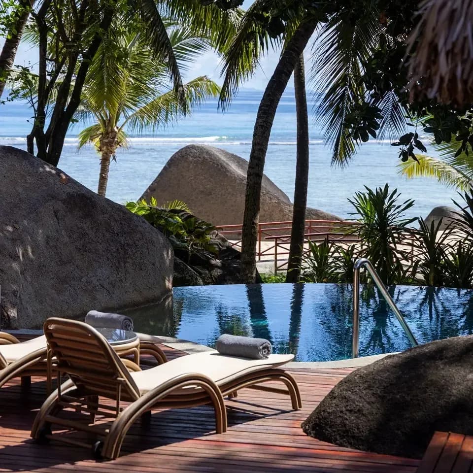 LIME Wellbeing spa freshwater plunge pool set among granite boulders and rainforest, Niva Labriz Seychelles