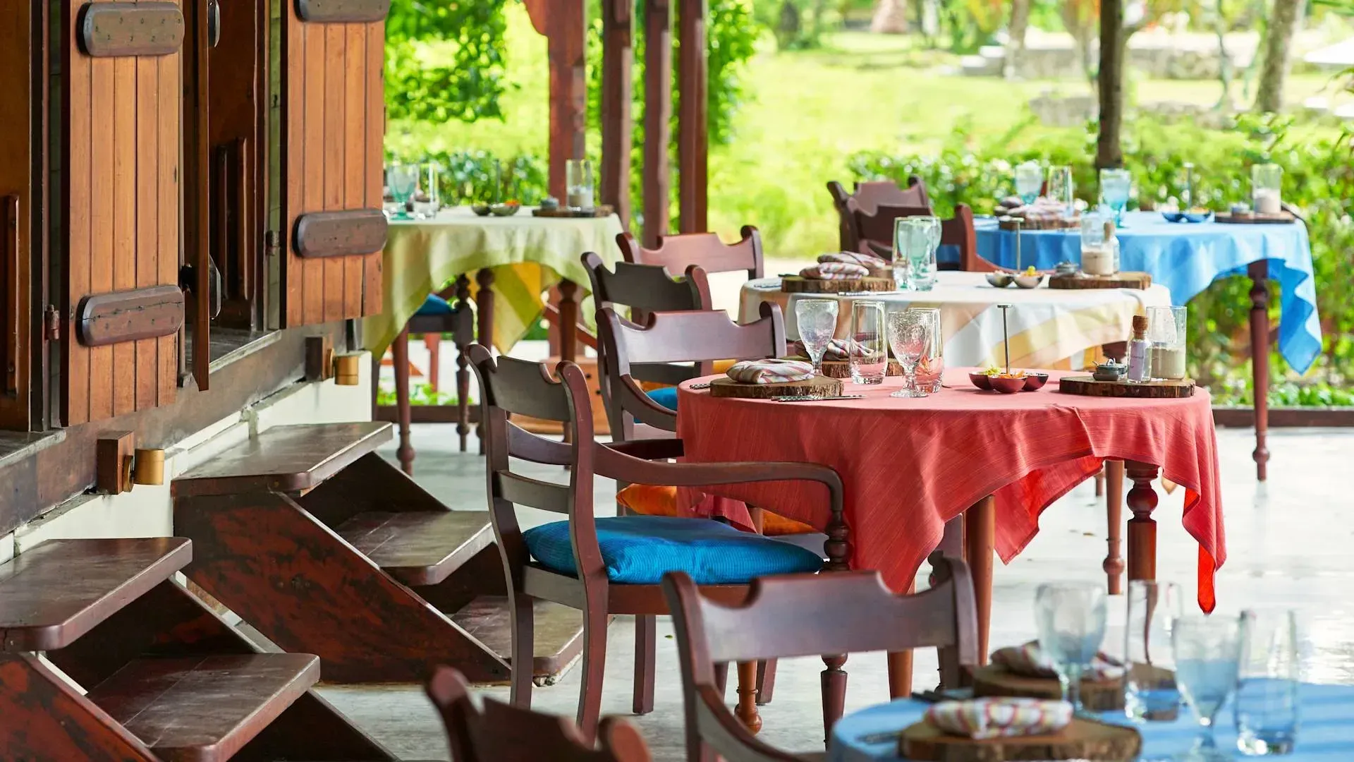 Grann Kaz veranda dining setting in the restored Dauban family home at Niva Labriz Seychelles