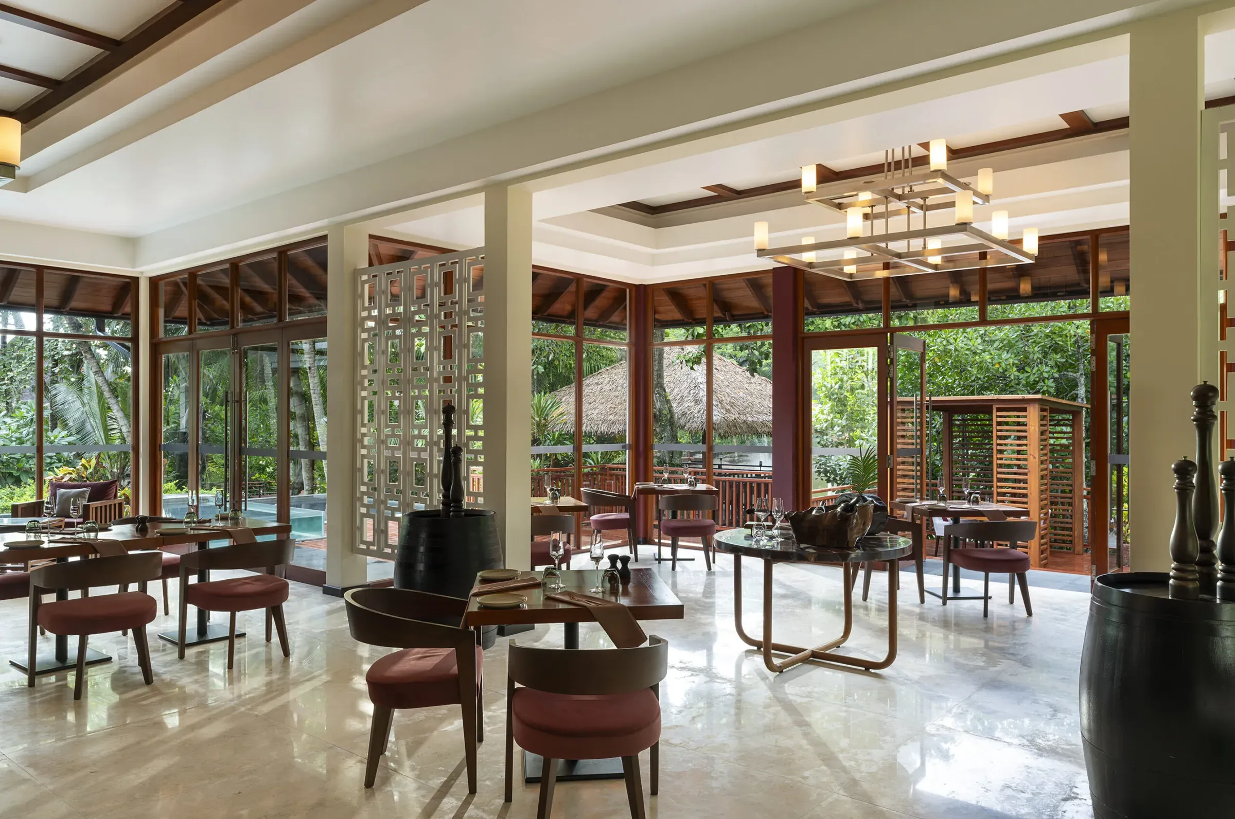 Portobello restaurant interior with lakeside terrace at Niva Labriz Seychelles