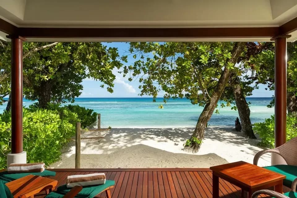 Beach Villa terrace looking onto the shoreline at Niva Labriz Seychelles