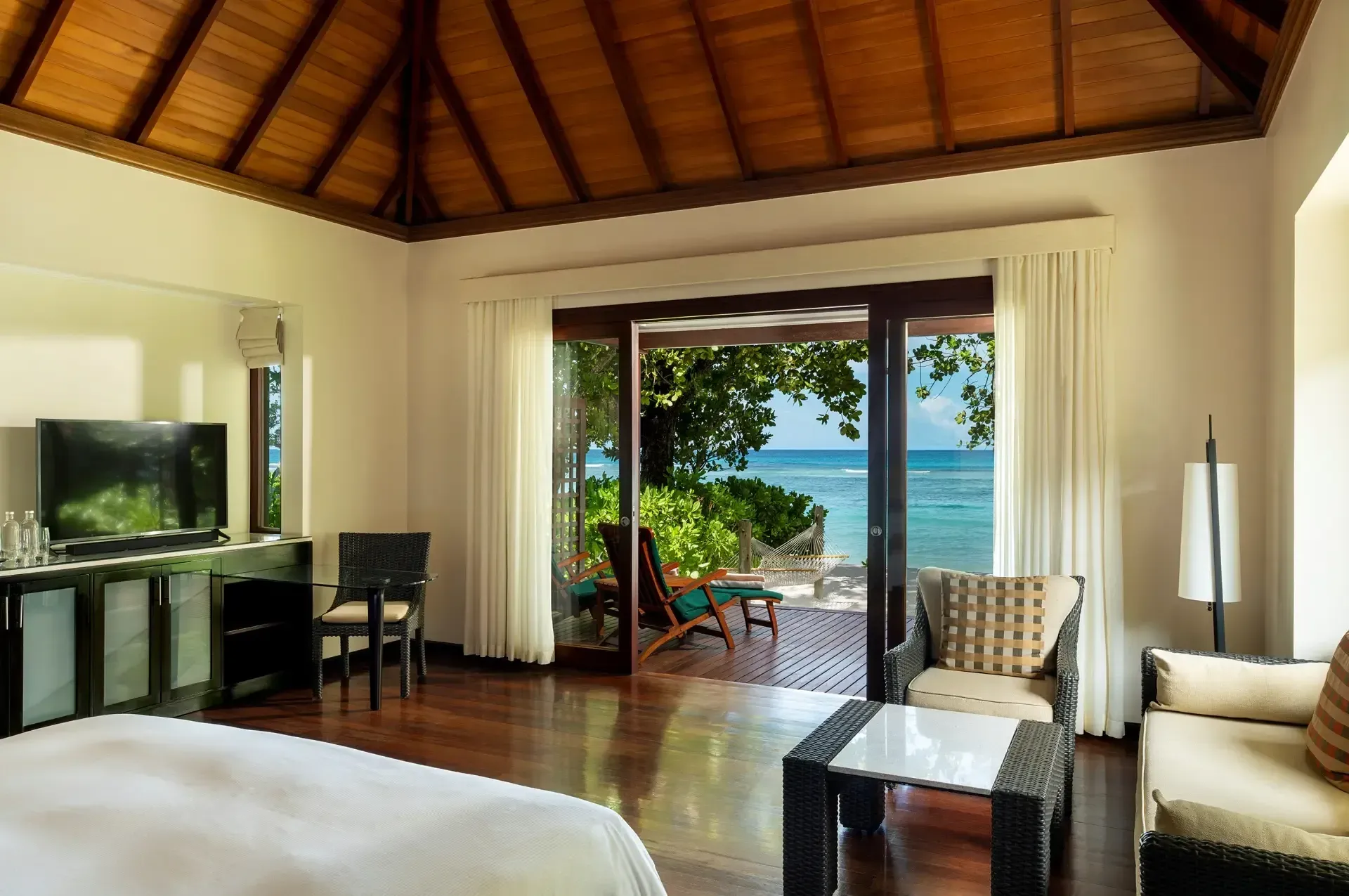 Two Bedroom Beach Villas pool deck overlooking the mountainside at Niva Labriz Seychelles