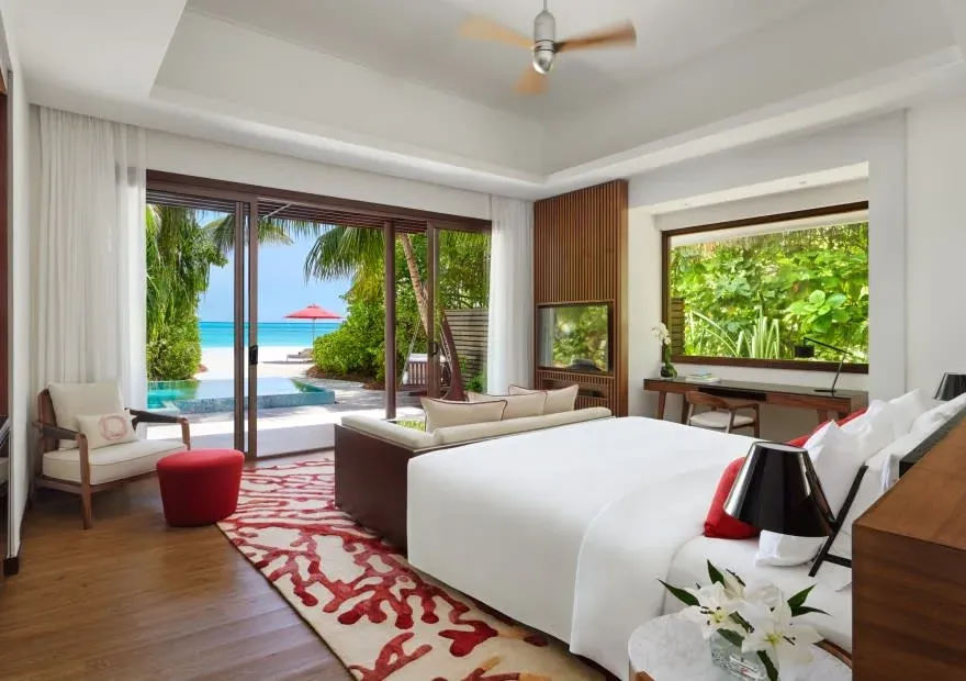 Deluxe Beach Pool Villa bedroom with ocean view at Niyama Private Islands Maldives