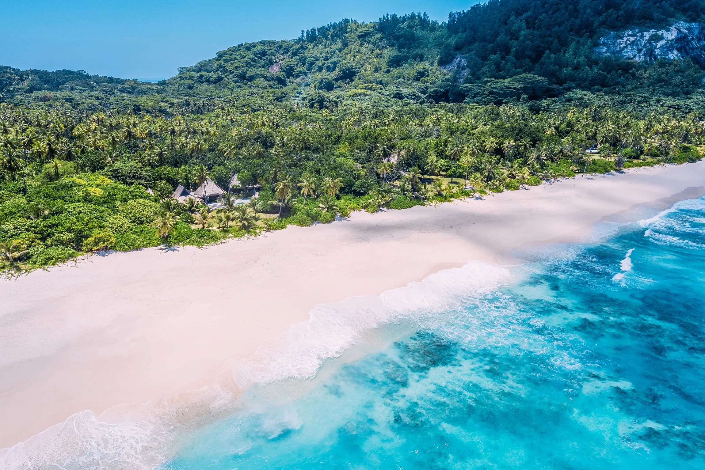 Aerial view of a Beachfront Villa and lagoon at North Island, Seychelles