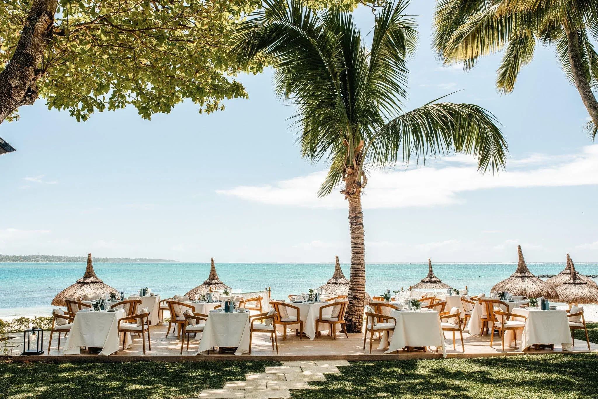 Le Badamier open-air dining setting beneath the Badamier tree at One&Only Le Saint Géran