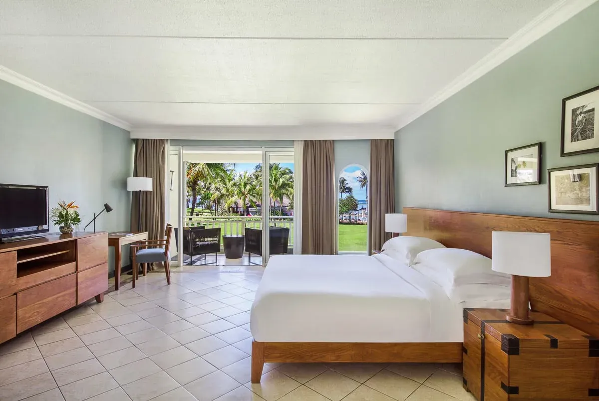 Ocean View room interior with king bed at OUTRIGGER Mauritius Beach Resort