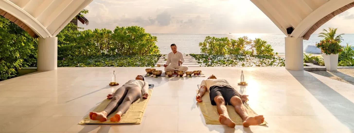 Sound bowl healing session at the overwater ELE|NA spa pavilion, OZEN LIFE MAADHOO