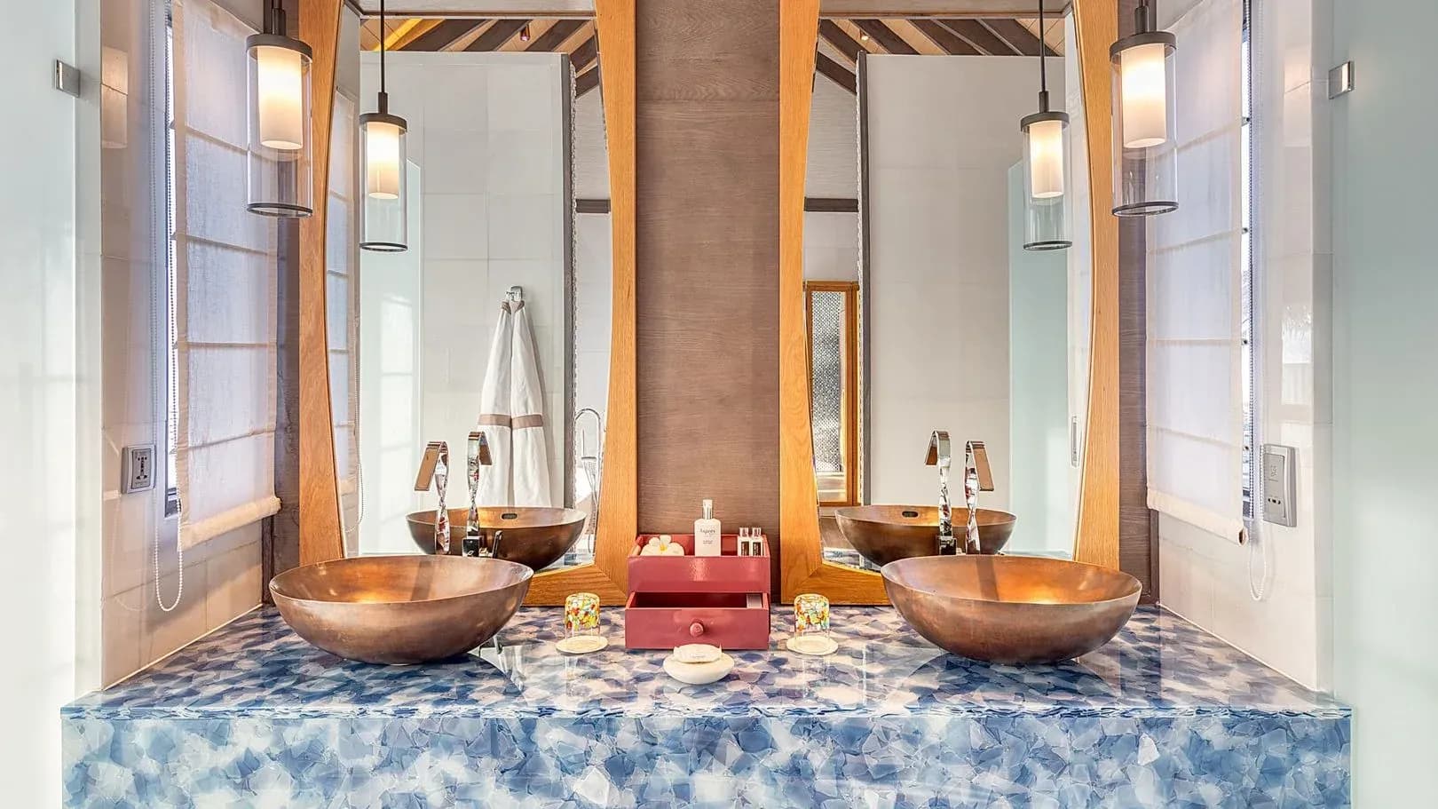 Wind Villa With Pool bathroom with twin stone basins at OZEN LIFE MAADHOO