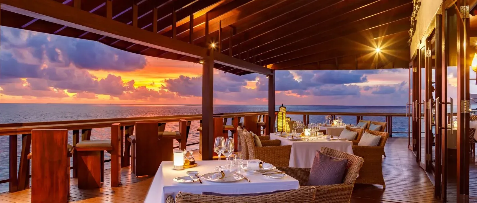 ORIGINƎ overwater fine-dining terrace at sunset, OZEN RESERVE BOLIFUSHI