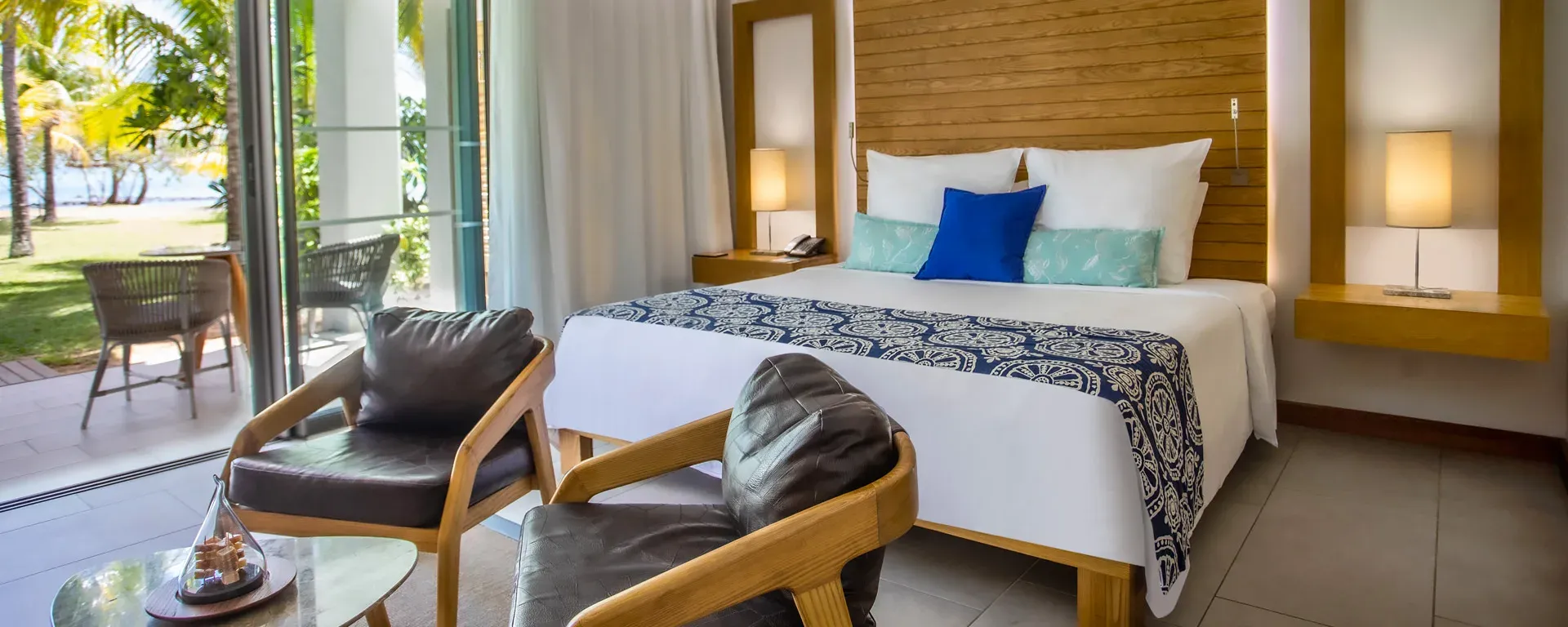 2-Bedroom Paradis Family Suite Beachfront bedroom at Paradis Beachcomber