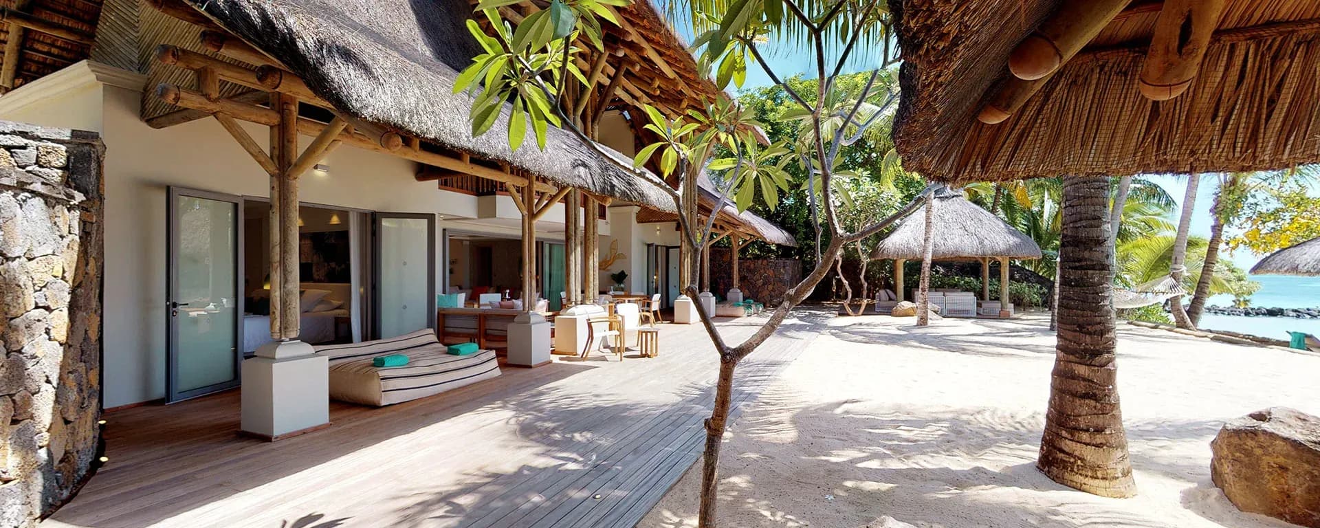 Presidential Villa hallway with lagoon view at Paradis Beachcomber