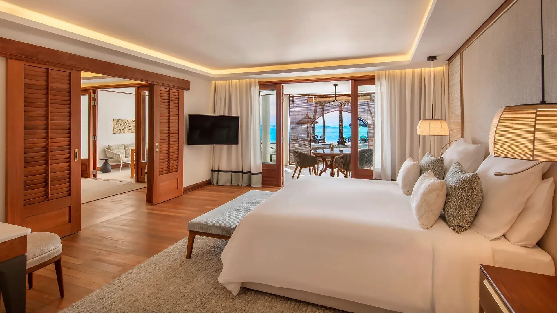 Senior Suite Beachfront living area with sea view at Paradis Beachcomber