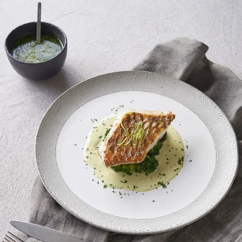Grilled fish dish served at The Cove restaurant, Paradise Cove Boutique Hotel
