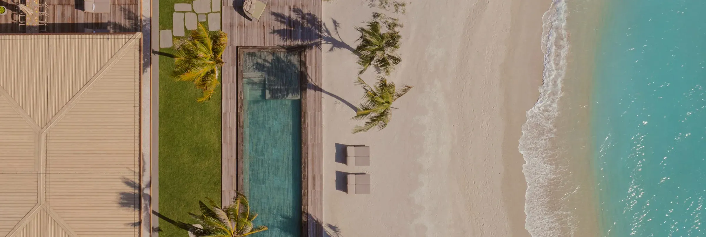 Aerial view of a Beach Pool Villa deck, pool and beach at Patina Maldives, Fari Islands