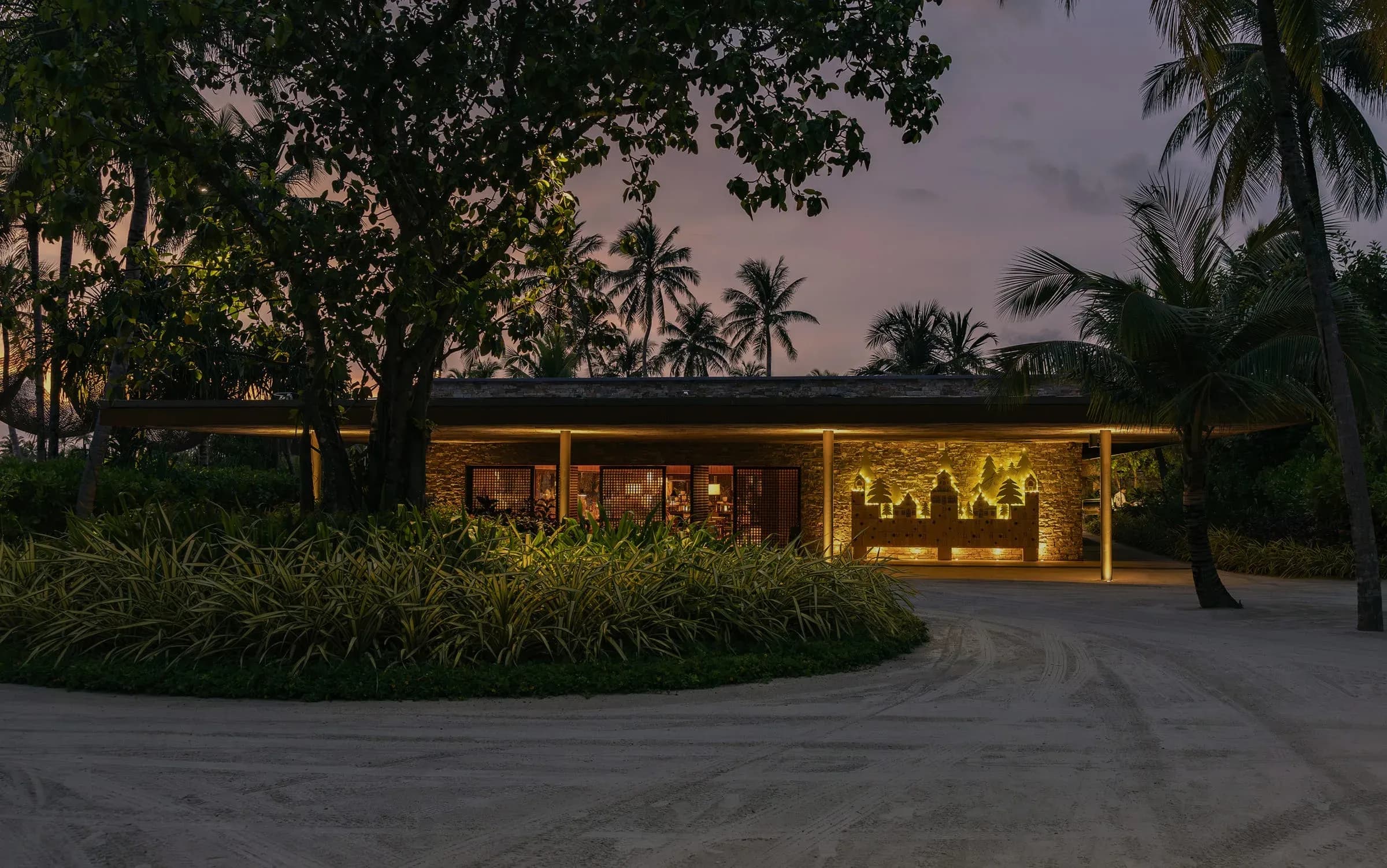 Coastal restaurant interior with natural lighting at Portico, Patina Maldives