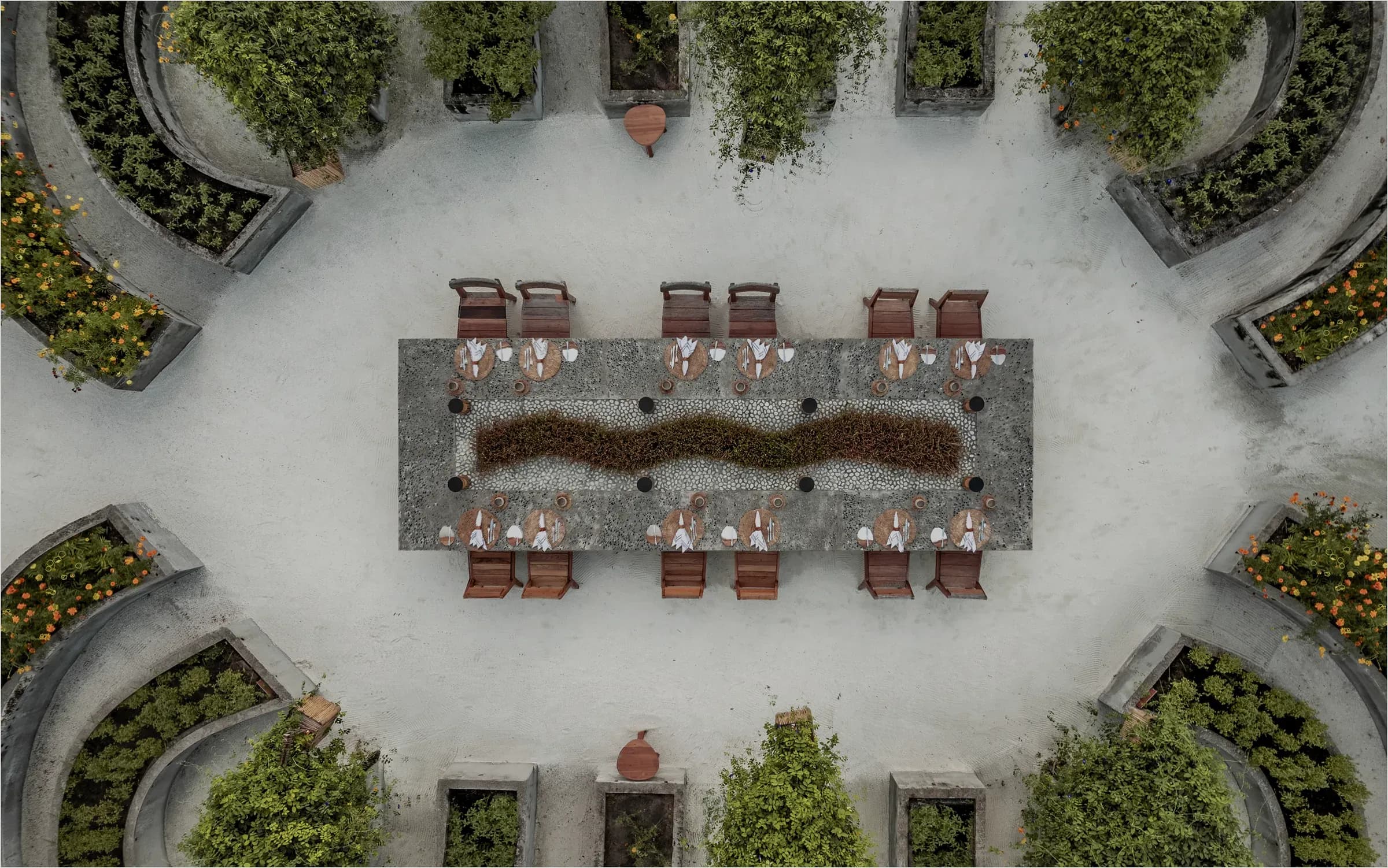Aerial view of the garden dining table at Roots plant-based restaurant, Patina Maldives