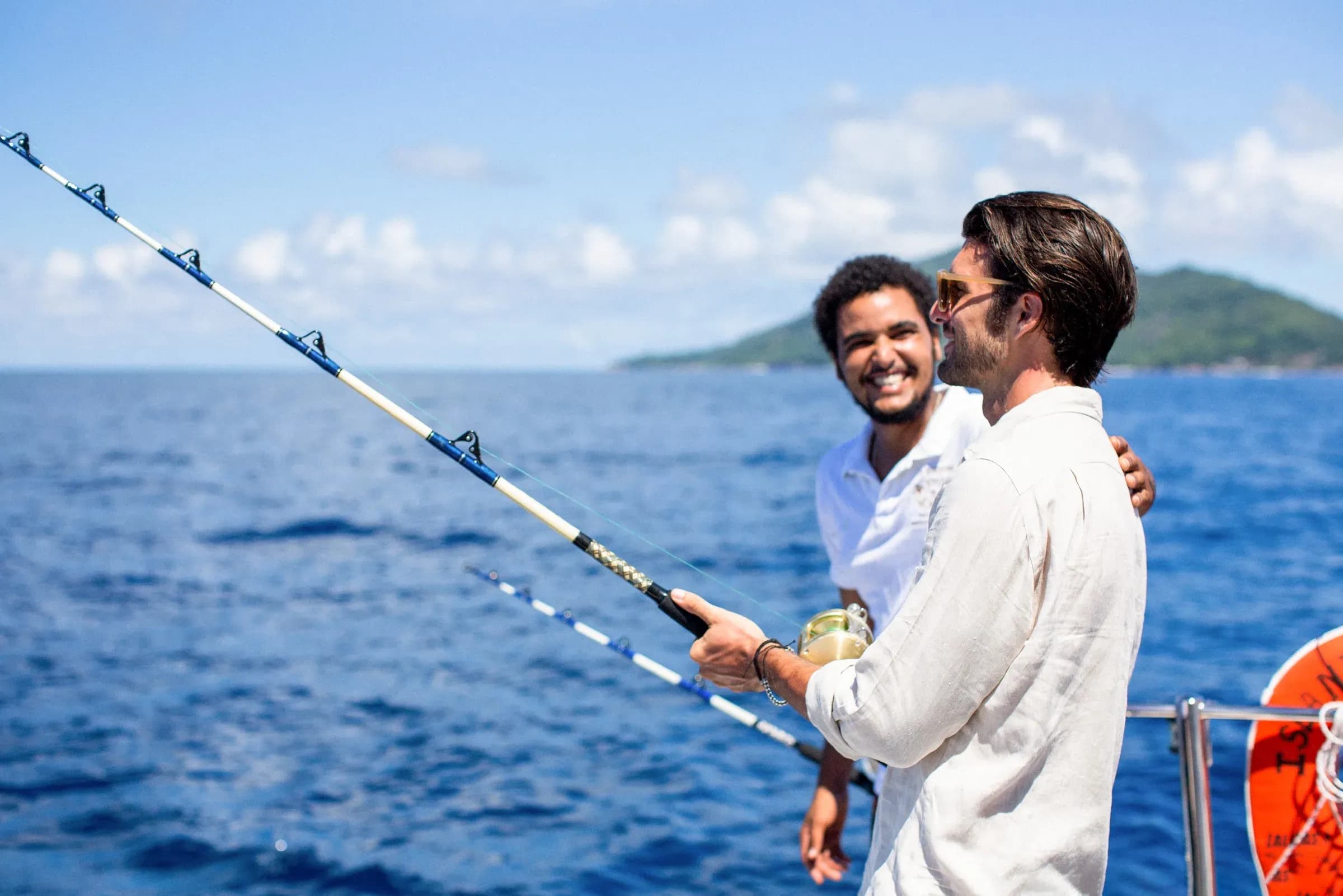 Guests deep-sea fishing off Praslin at Raffles Seychelles