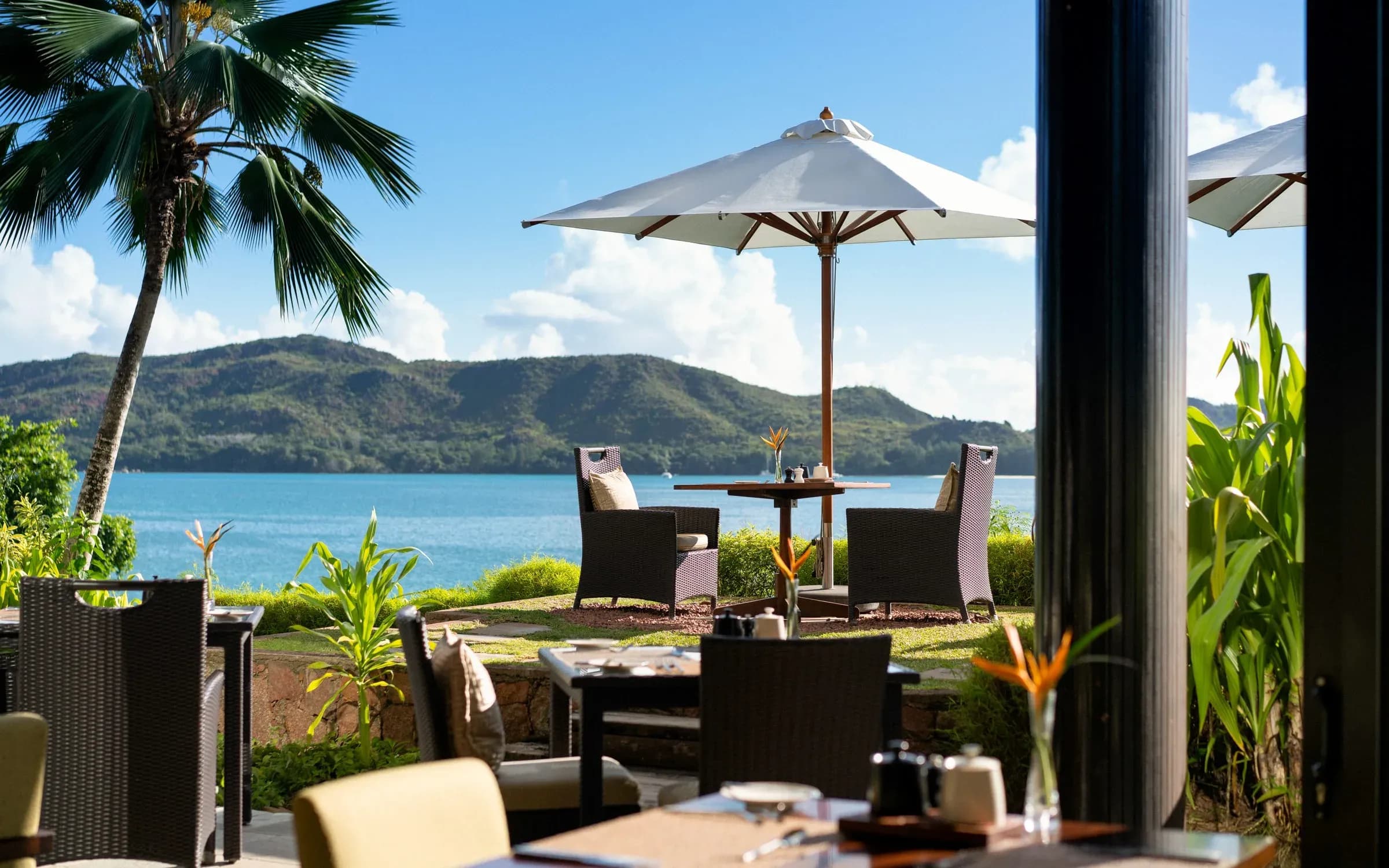 Losean Restaurant terrace overlooking Curieuse Island at Raffles Seychelles