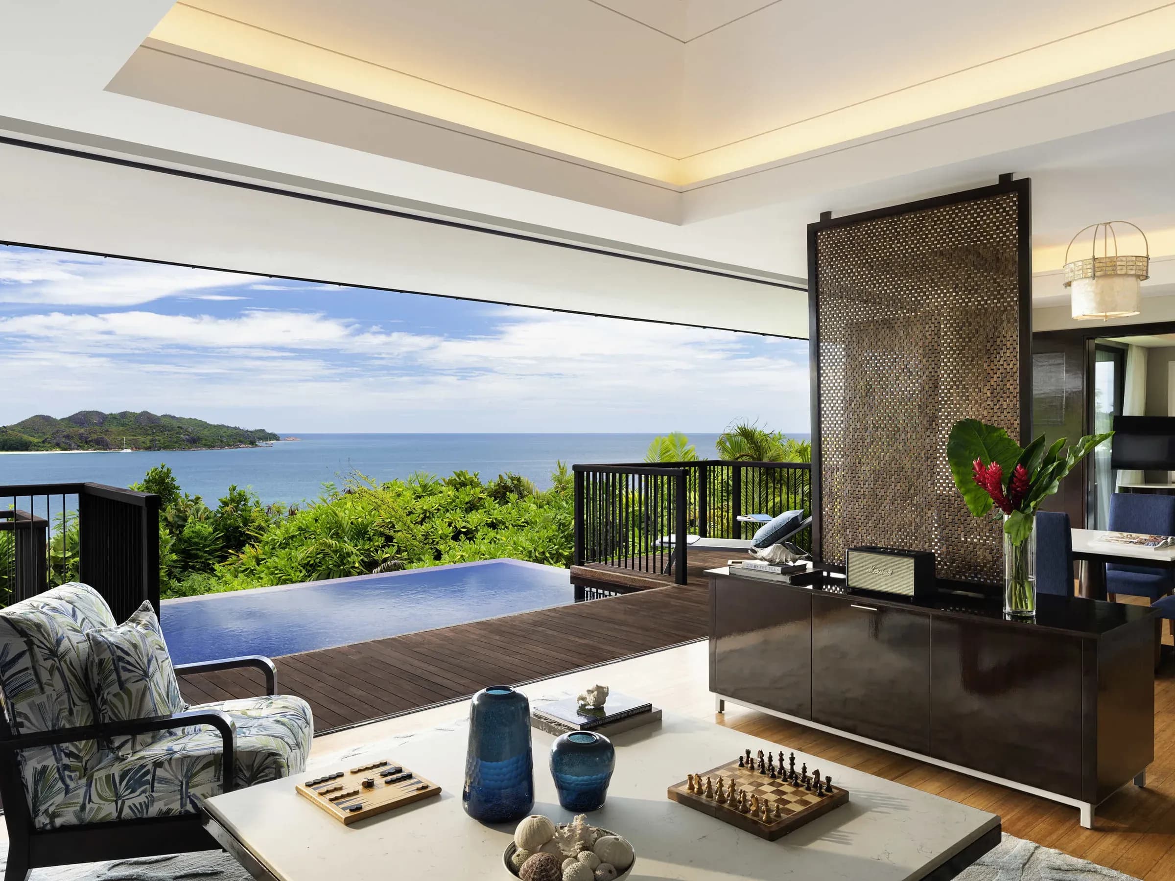 Grand Panoramic Pool Villa interior and pool deck at Raffles Seychelles