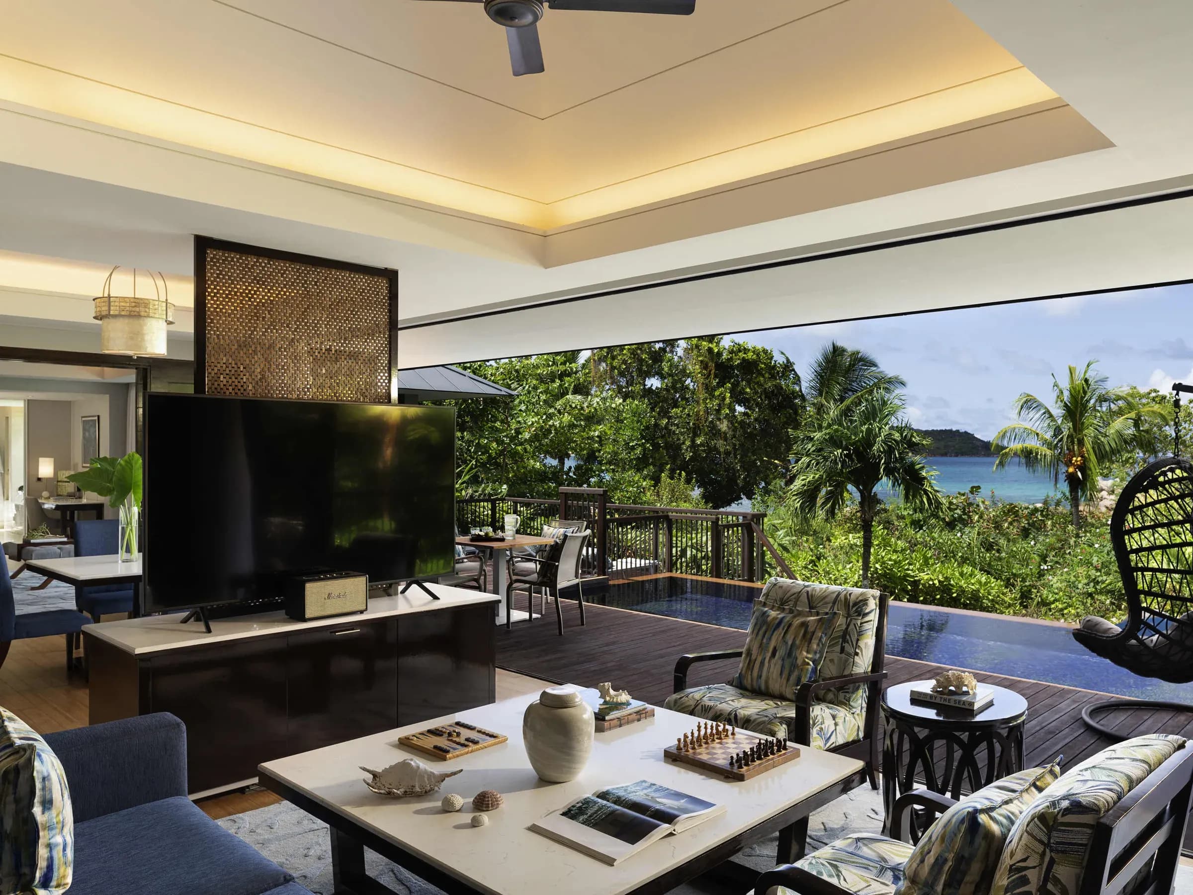Two Bedroom Beachfront Pool Villa pool deck at Raffles Seychelles