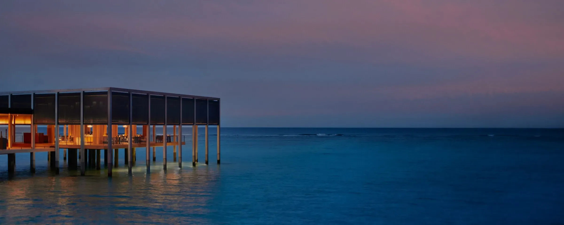 Waterfront dining terrace at La Locanda, The Ritz-Carlton Maldives, Fari Islands