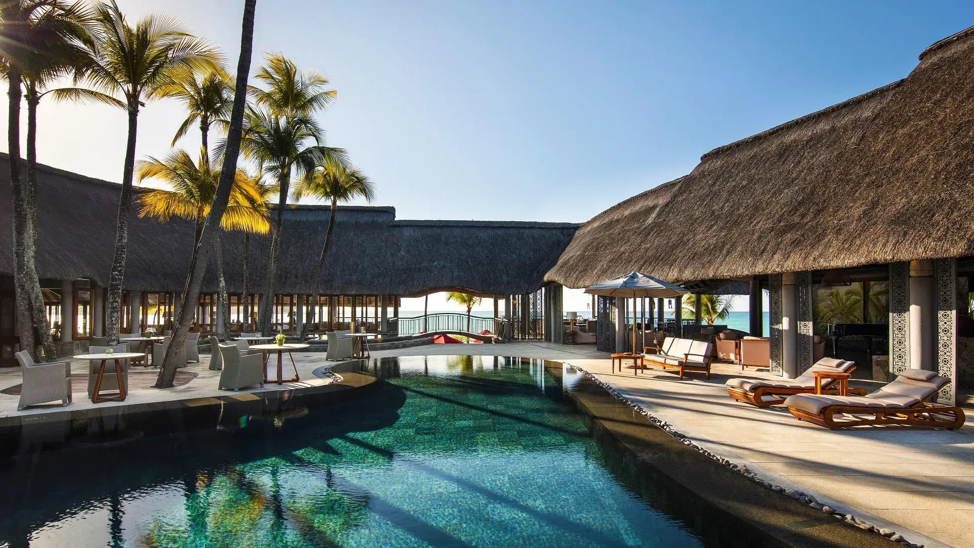 Beachfront gardens and swaying palms at Royal Palm Beachcomber Luxury