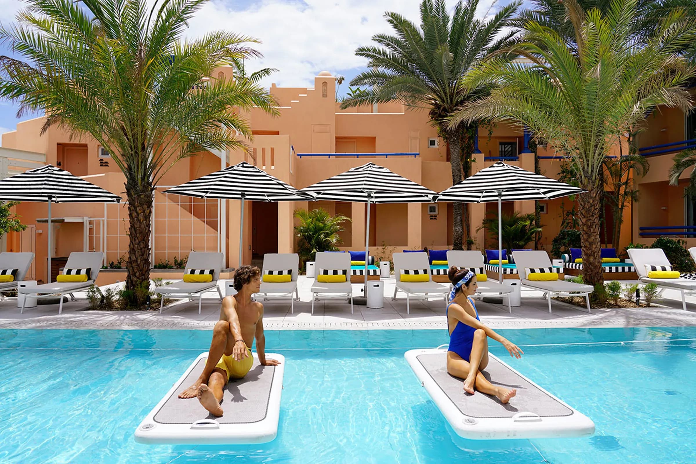 Guests relaxing on floating pool mats in the pool at SALT of Palmar