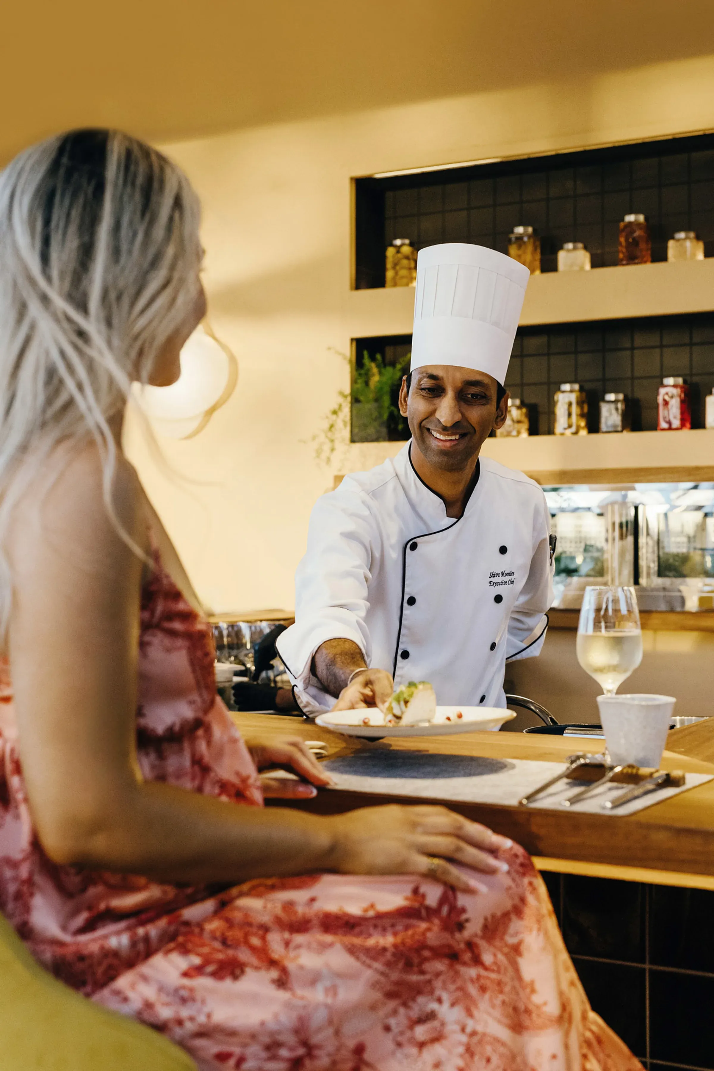 Executive Chef Shiva Moonien serving a guest at Tek Tek, SALT of Palmar's ten-seat beachside restaurant