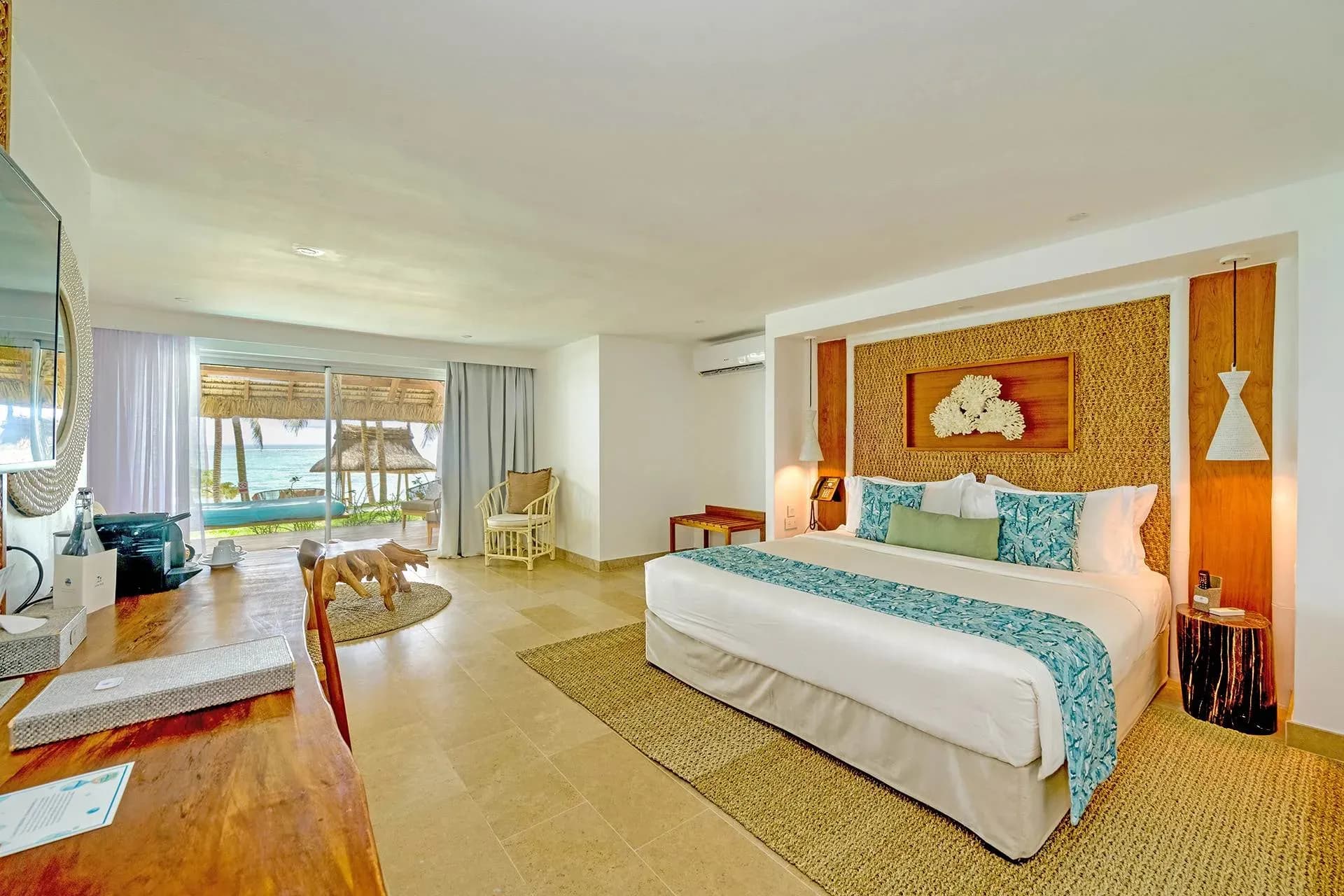 Beachfront & Ocean Suite bedroom with direct beach access at Seasense Boutique Hotel & Spa
