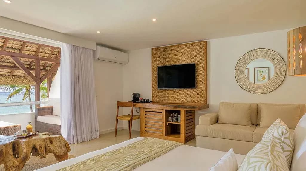Junior Sea Suite (Presidential) lounge and outdoor deck at Seasense Boutique Hotel & Spa
