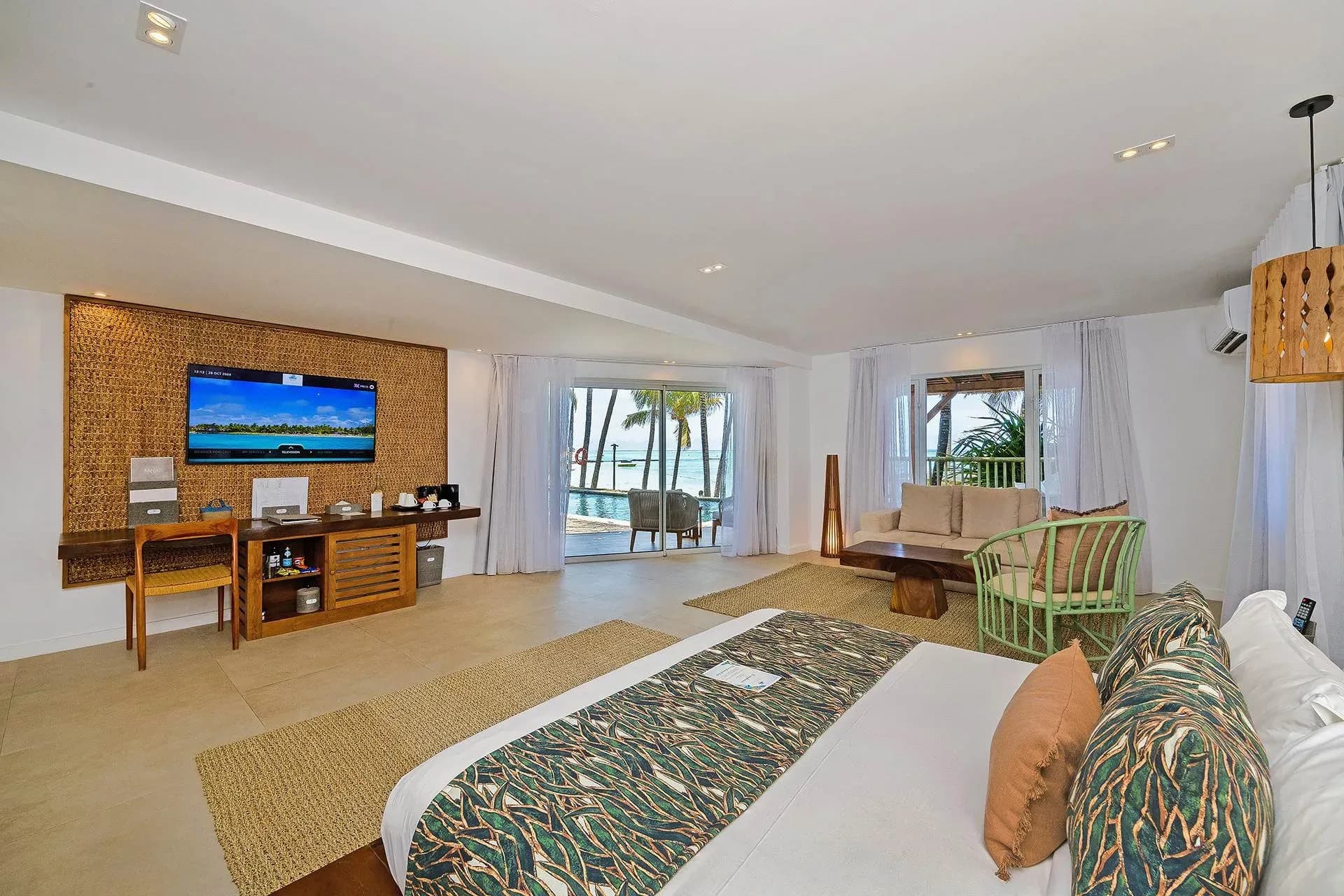 Senior Sea Suite (Royal) bedroom and lounge opening onto a private pool at Seasense Boutique Hotel & Spa