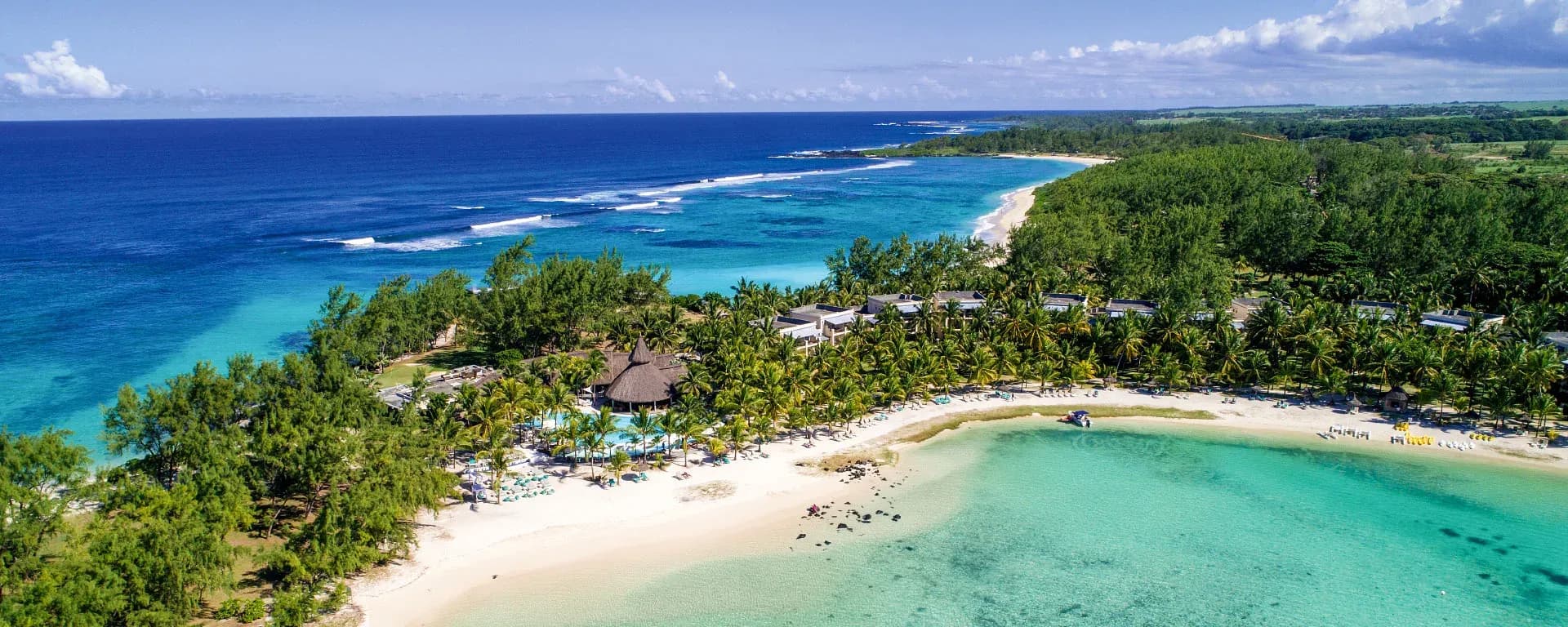 Aerial view of Shandrani Beachcomber Resort & Spa's peninsula, beaches and lagoon on the south-east coast of Mauritius